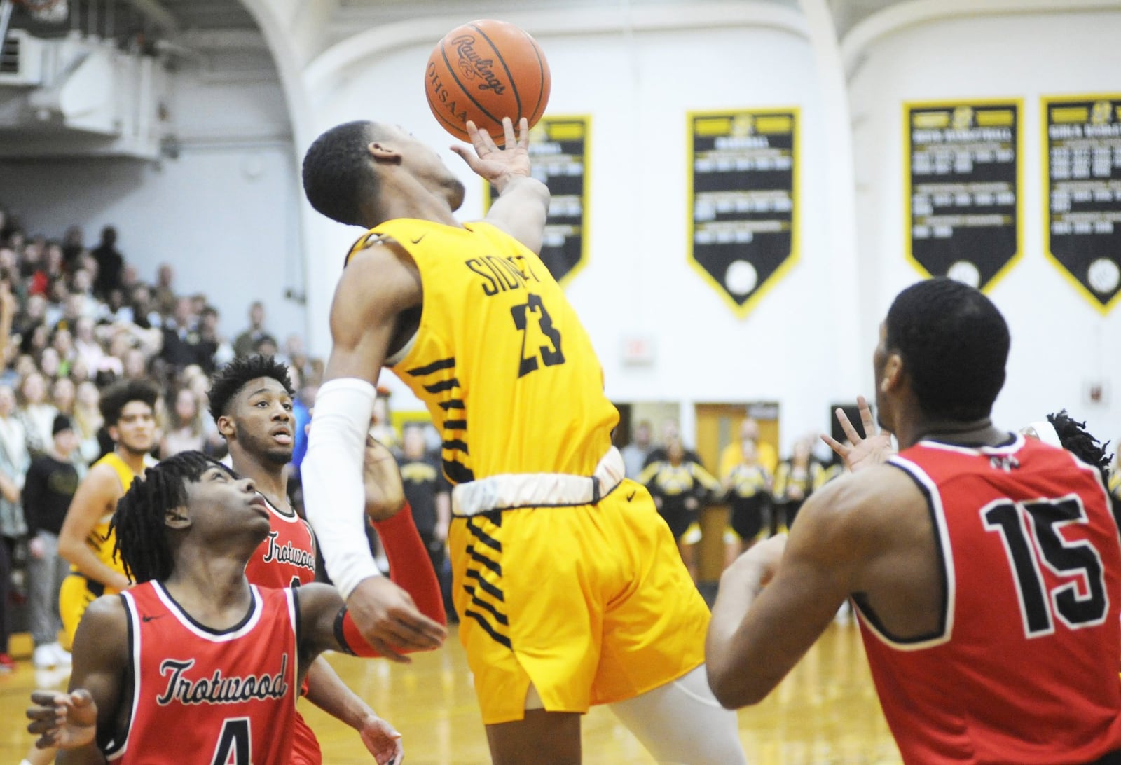 A loose ball eludes Sidney’s Josiah Hudgins. Trotwood-Madison defeated host Sidney 90-69 in a boys high school basketball game on Friday, Jan. 25, 2019. MARC PENDLETON / STAFF