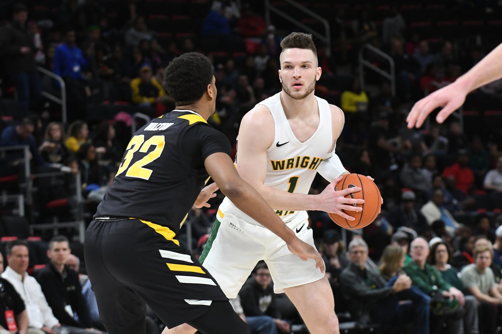 Wright State’s Bill Wampler is defending by Northern Kentucky’s Dantez Walton during the Horizon League tournament championship game. Keith Cole/CONTRIBUTED