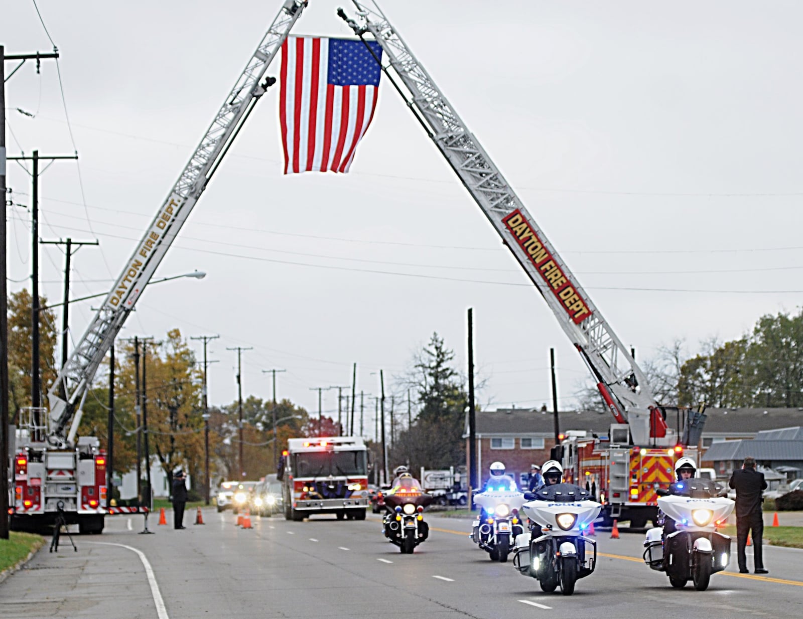 A procession was held on Friday, Nov. 2, 2018, for Robert Bobby Hetzer Jr., who worked for the Dayton Fire Department for about 29 years and died Oct. 26. MARSHALL GORBY / STAFF