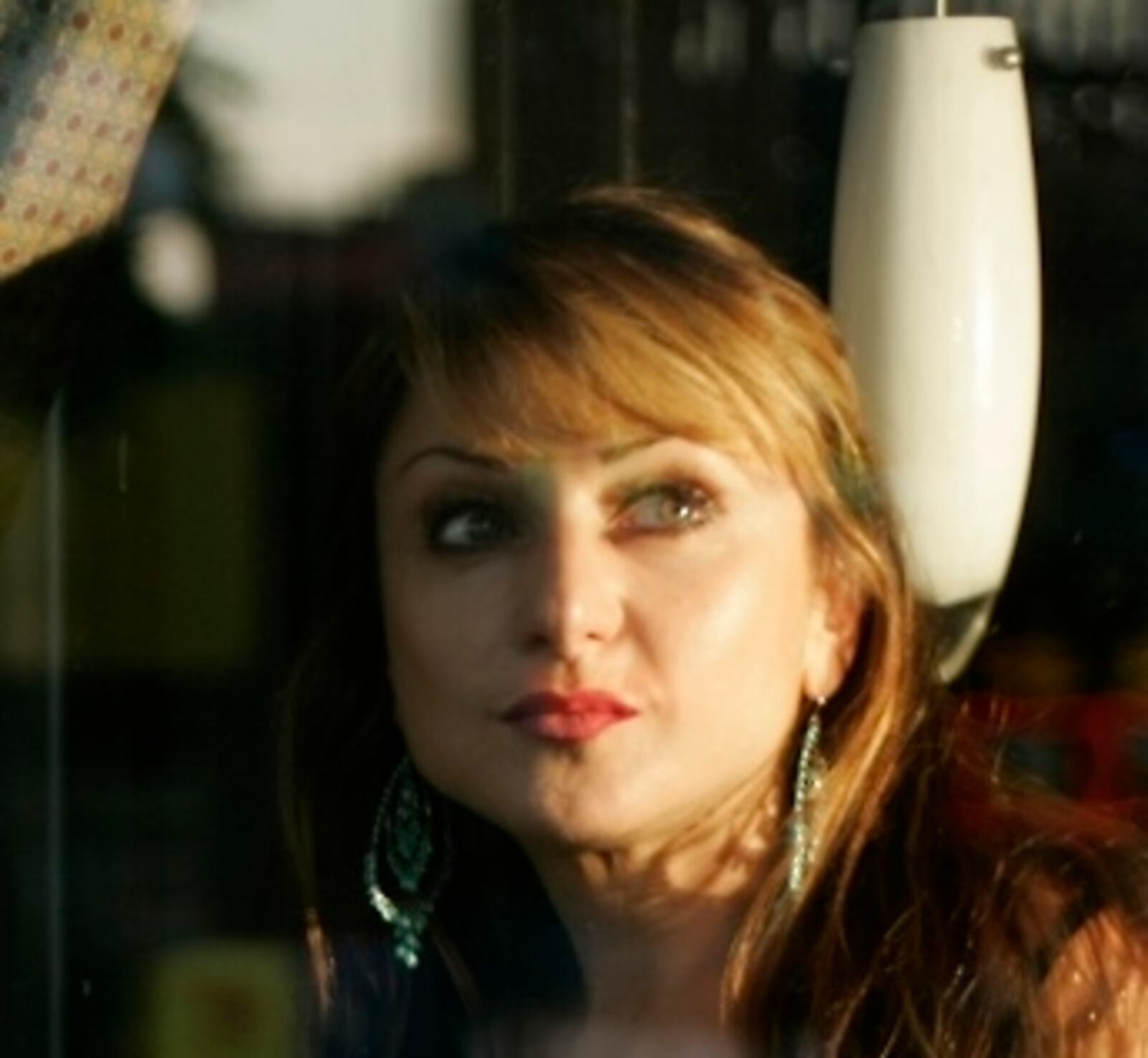 In this file photo from 2009, Eva Christian stands in the window of what was then her Oregon District restaurant, Cafe Boulevard. Staff file photo by Jim Witmer