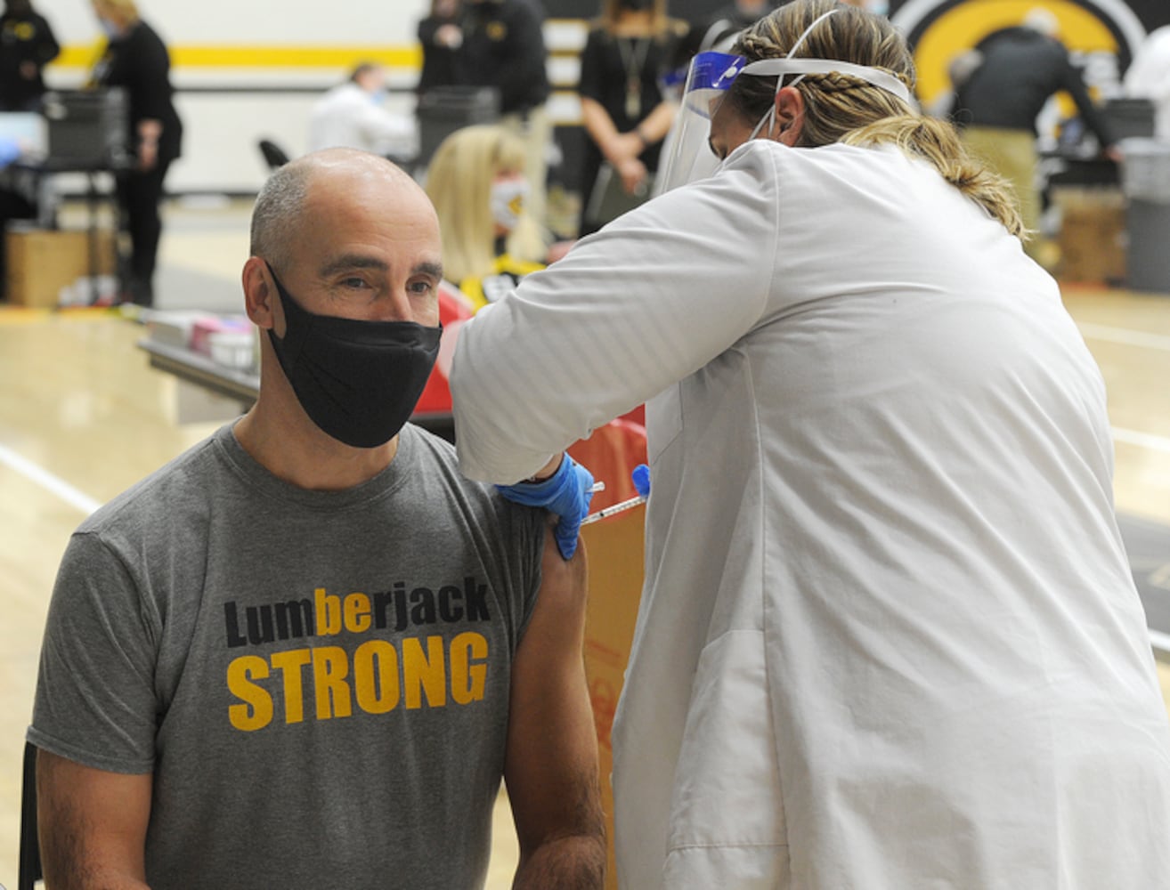 PHOTOS: Area school workers get COVID vaccine