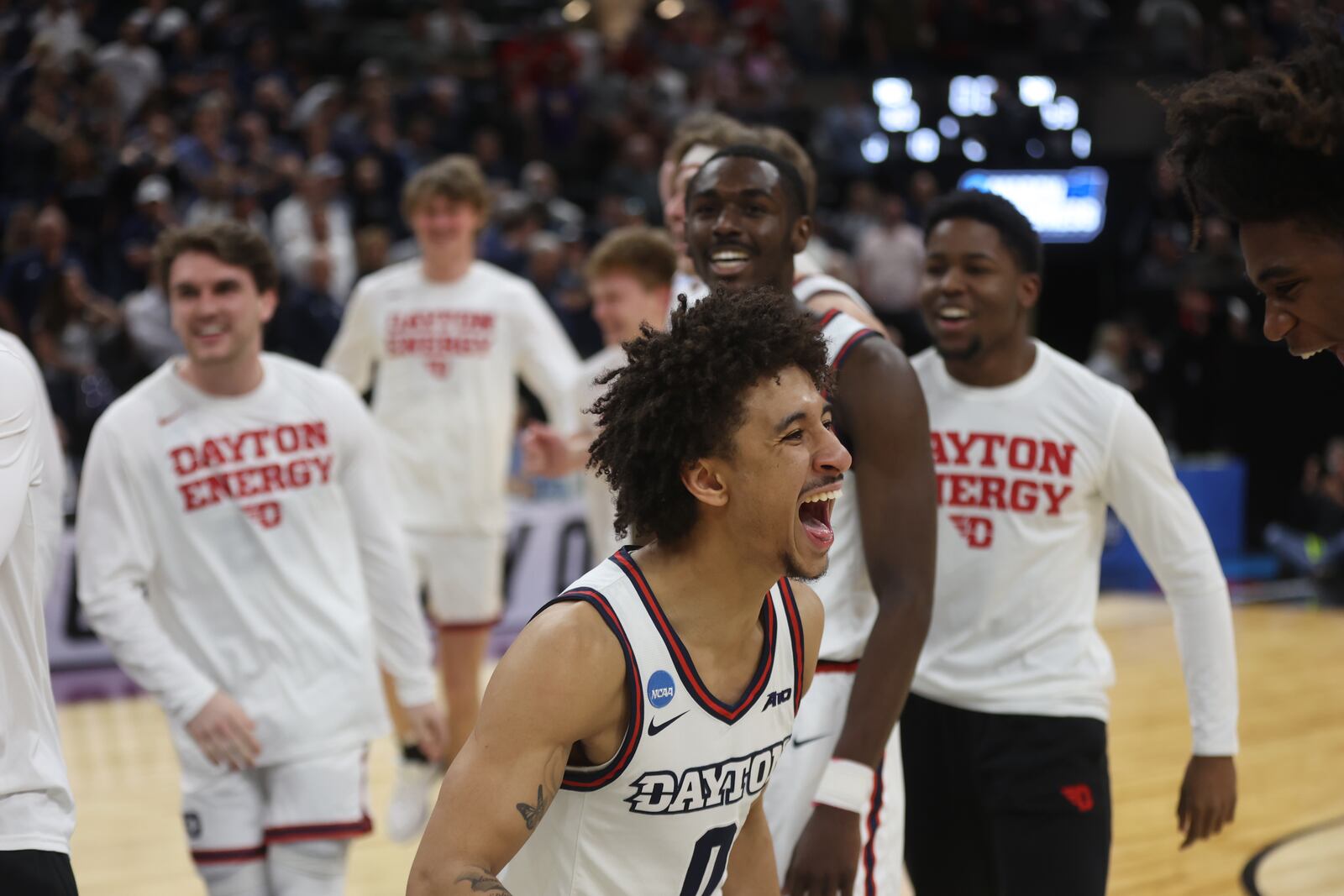 Dayton's Javon Bennett celebrates a victory against Nevada in the first round of the NCAA tournament on Thursday, March 21, 2024, at the Delta Center in Salt Lake City, Utah. David Jablonski/Staff