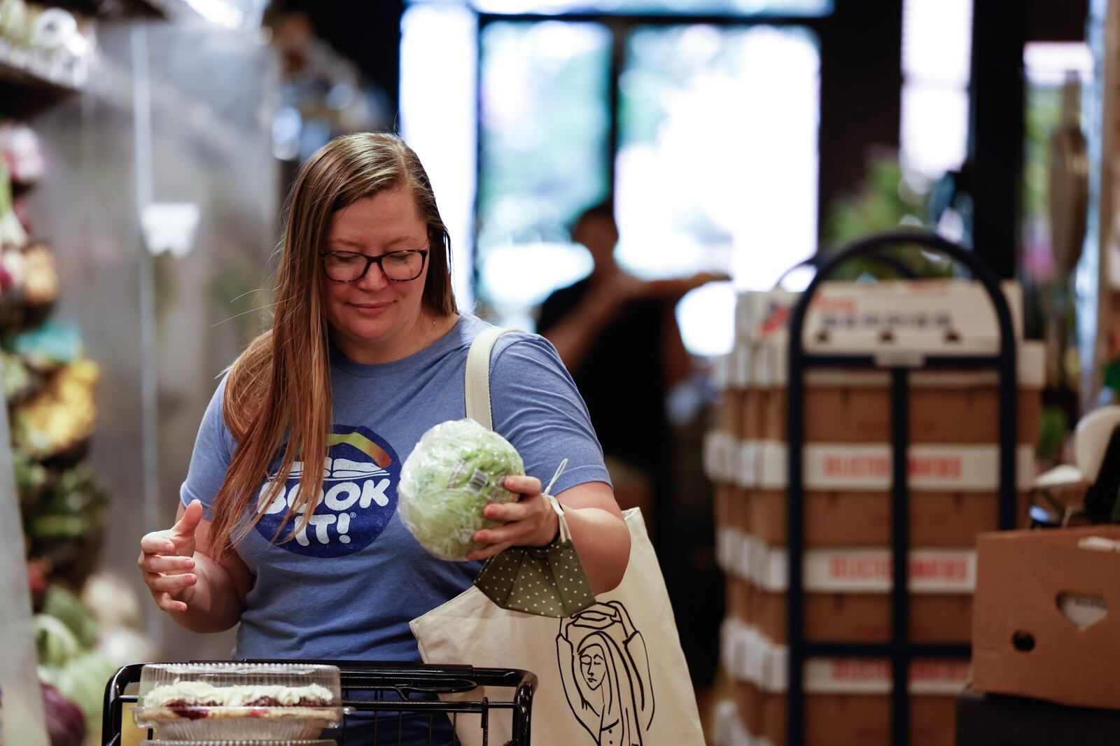 Stefanie Hunter, from Oakwood, shops for the holiday weekend at Dorothy Lane Market in Oakwood Friday July 2, 2021. JIM NOELKER/STAFF