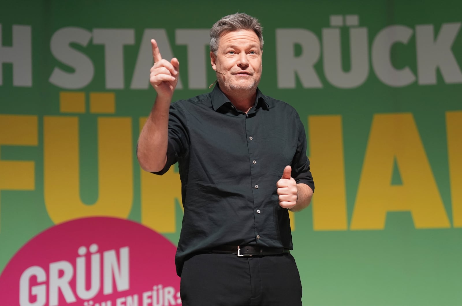 Robert Habeck, candidate for Chancellor and Federal Minister for Economic Affairs and Climate Protection, speaks at a campaign event of Alliance 90/The Greens in Hamburg, Friday Feb. 21, 2025, ahead of the elections Sunday. (Marcus Brandt/dpa via AP)