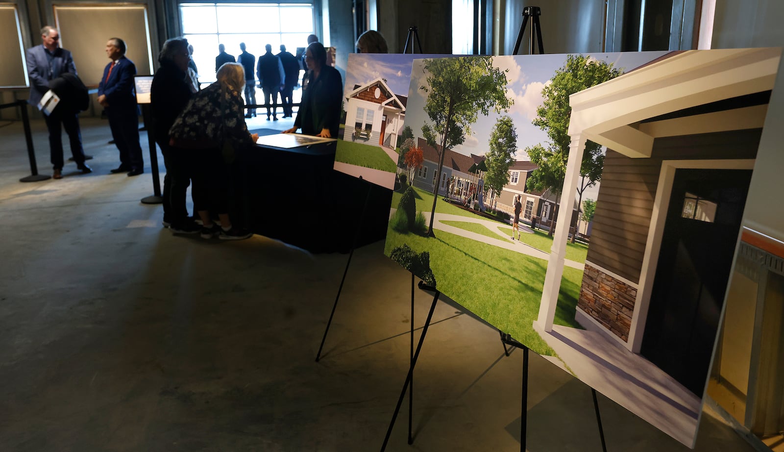 Artist renderings were on display Thursday, Dec. 5, 2024 on the fifth floor of Dayton Children's Hospital specialty care center to celebrate the start of their new housing construction project. MARSHALL GORBY\STAFF