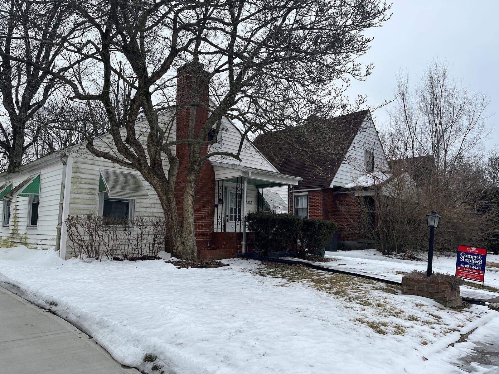 A home in northwest Dayton that recently was listed for sale online for $49,900. CORNELIUS FROLIK / STAFF