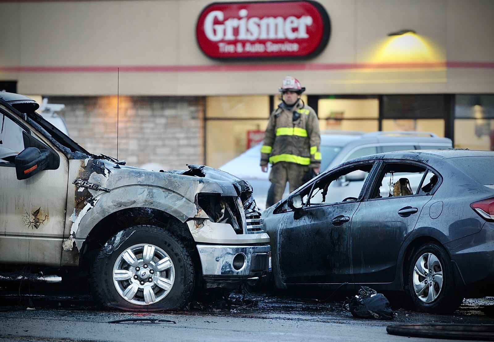 Police and medics responded to a fiery, multi-vehicle crash Tuesday afternoon, Jan. 24, 2023, on Brandt Pike north of Chambersburg Road in Huber Heights involving a white BMW reported stolen out of Clark County. MARSHALL GORBY/STAFF