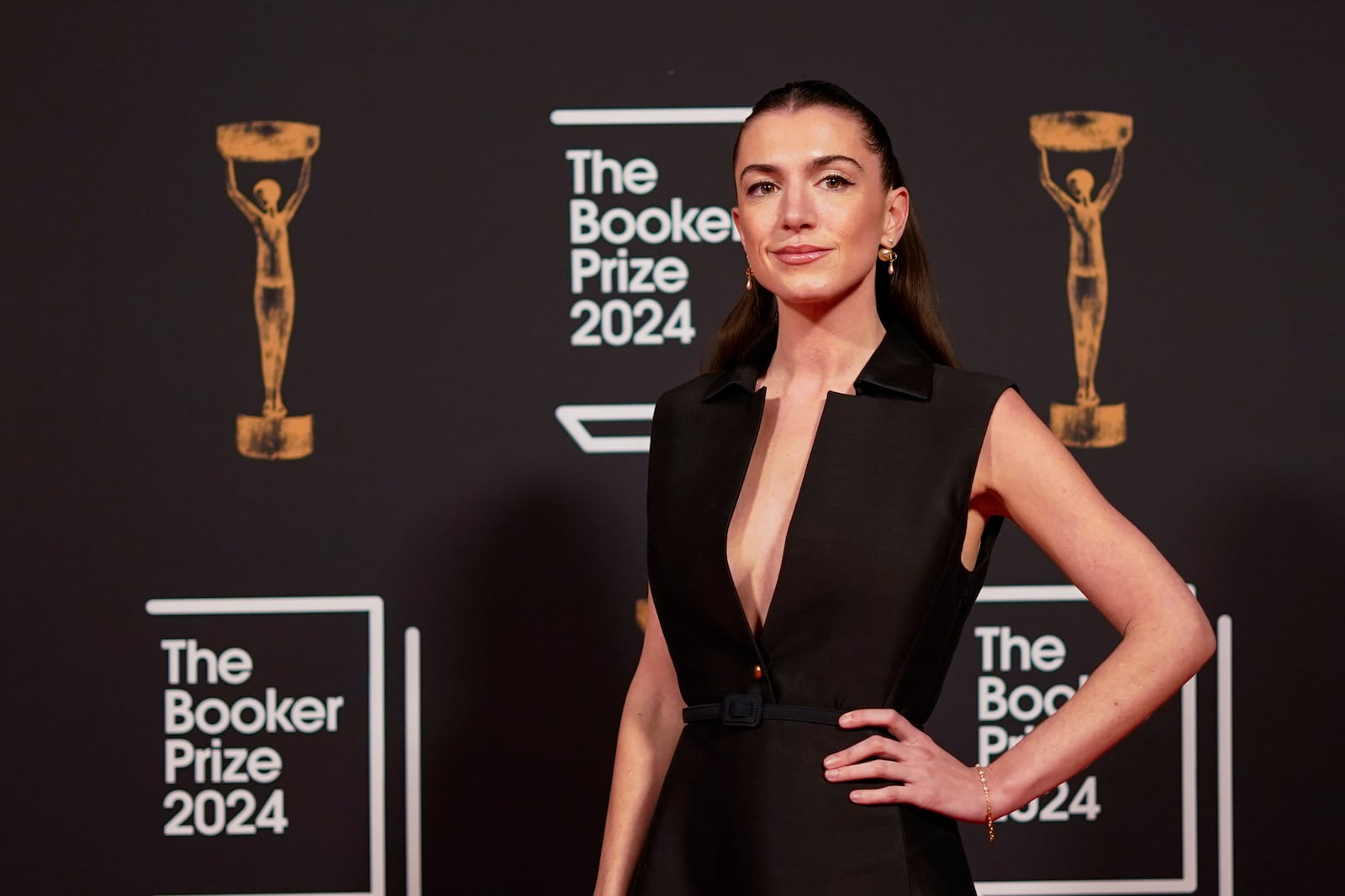 Katy Hessel arrives at the Booker Prize award dinner in London, Tuesday, Nov. 12, 2024. (AP Photo/Alberto Pezzali)