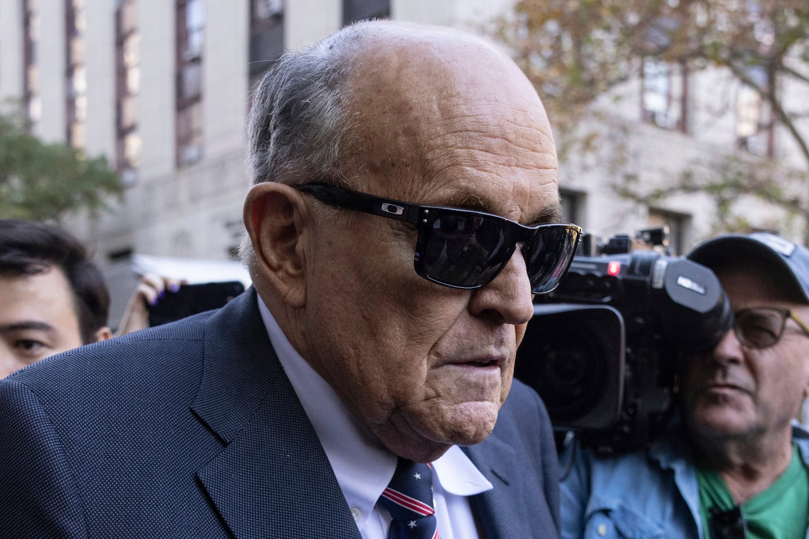 Former New York City Mayor Rudy Giuliani arrives at the court to explain to a federal judge why he hasn't surrendered his valuables as part of a $148 million defamation judgment, in New York, Thursday, Nov. 7, 2024. (AP Photo/Yuki Iwamura)