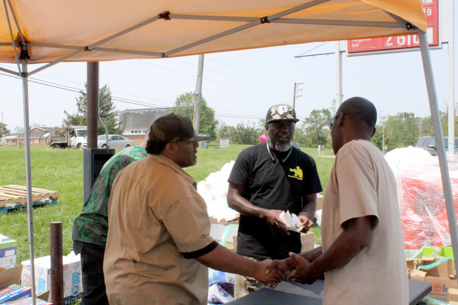 A donation center was set up following last week's tornadoes at Pippin’s Market in Trotwood.  Needed items include cleaning supplies, deodorant, body wash and baby items like diapers, wipes, baby food and formula.  Organizer Sylvester Darnell (center) is pictured.