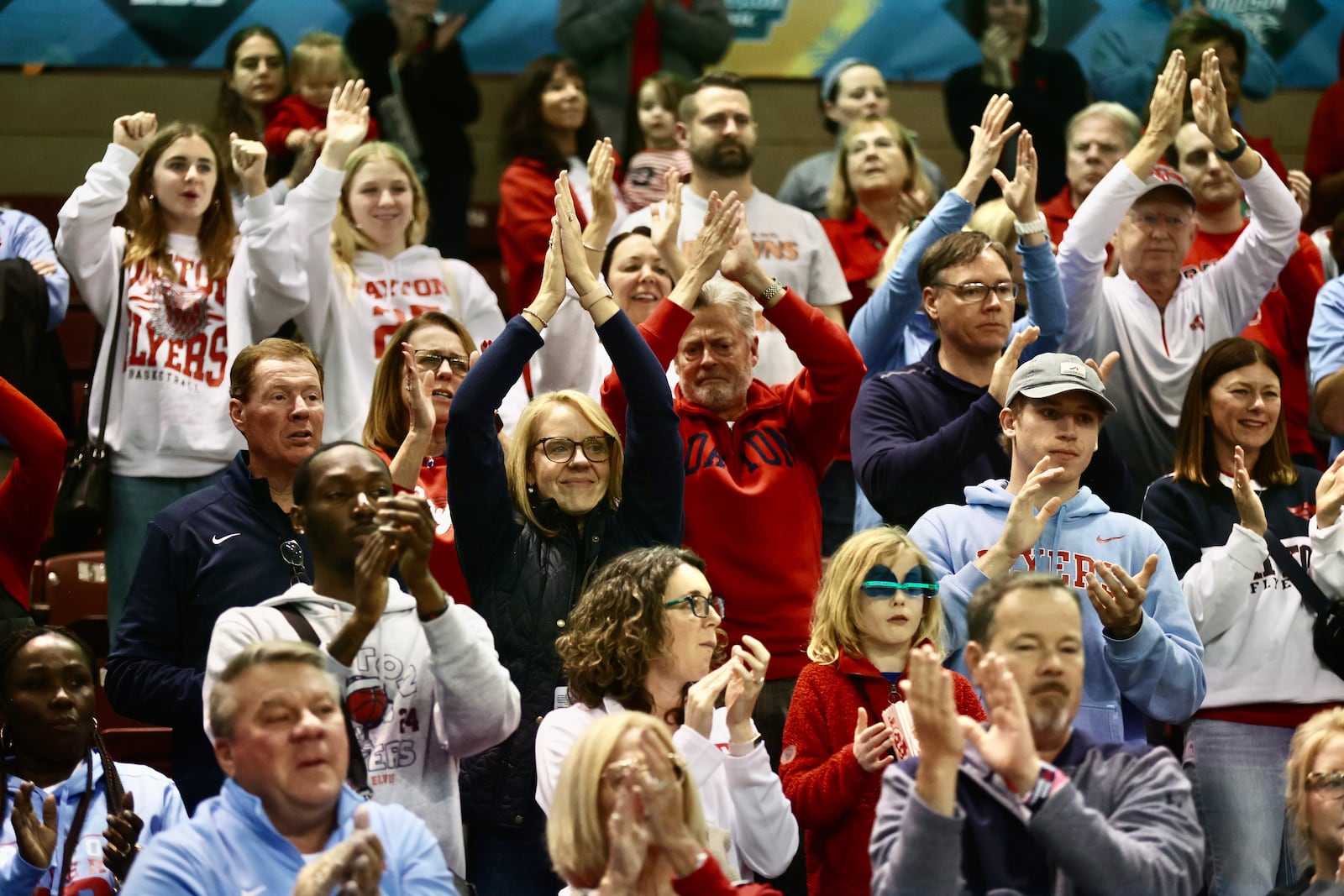 Dayton fans cheer the team after a loss to Houston in the Charleston Classic championship game on Sunday, Nov. 19, 2023, at TD Arena in Charleston, S.C. David Jablonski/Staff