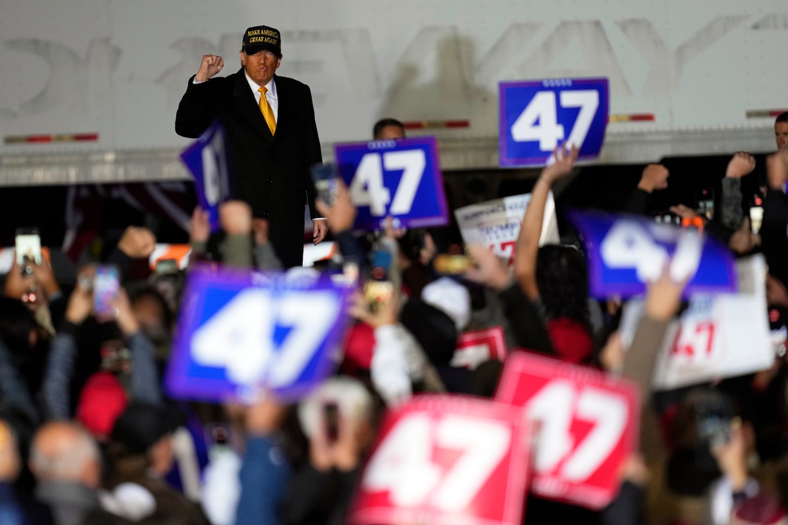 Republican presidential nominee former President Donald Trump greets the crowd at a campaign event Friday, Oct. 25, 2024, in Traverse City, Mich. (AP Photo/Paul Sancya)