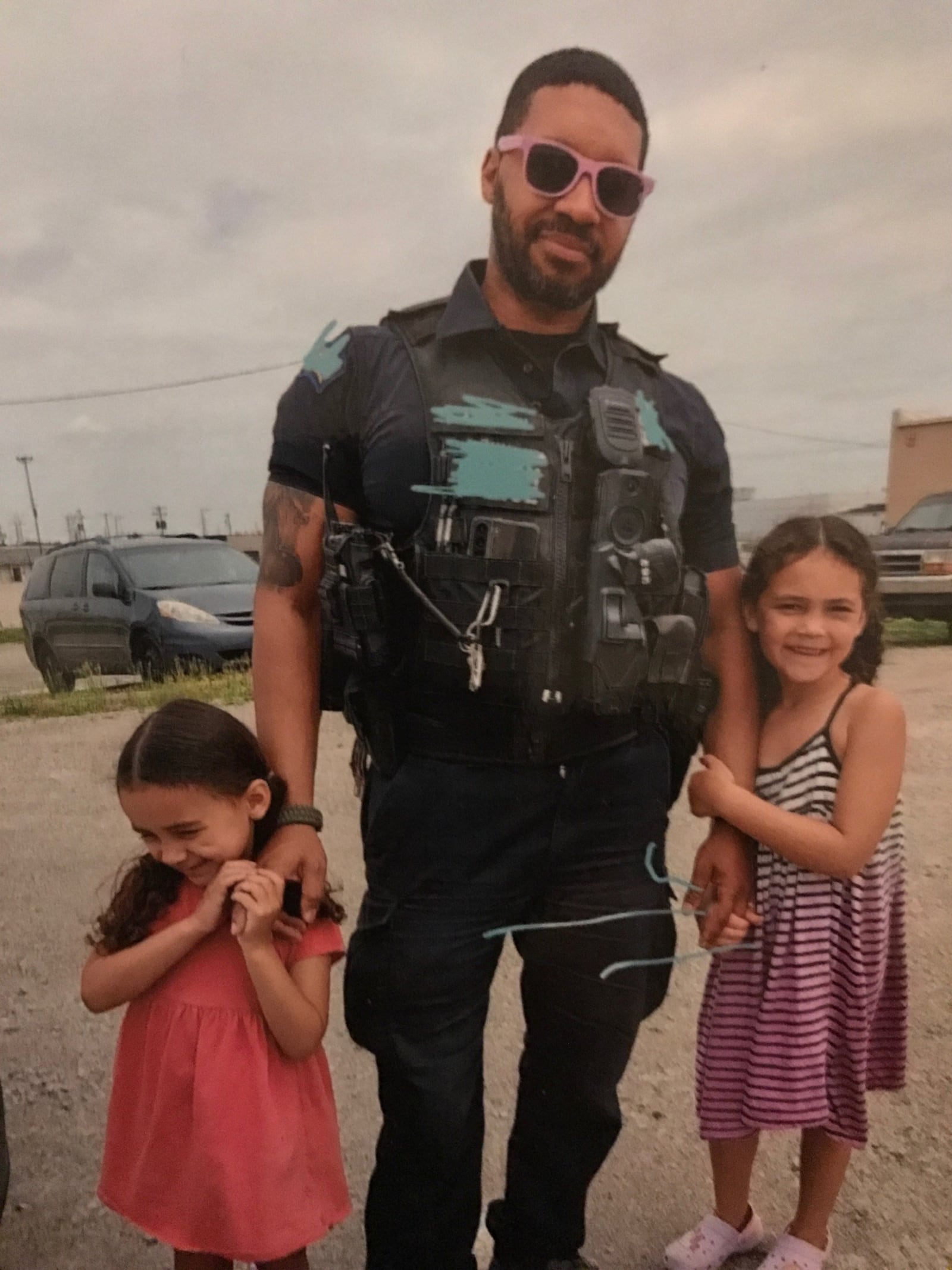 Dayton Police Officer Byron Branch with his two daughters, Chloe and Peyton. CONTRIBUTED