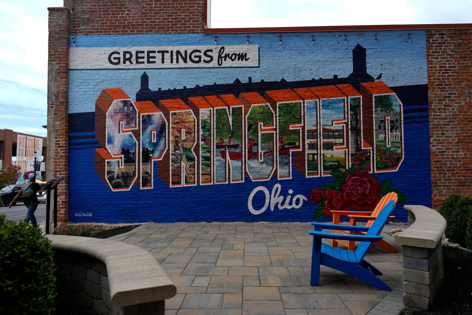 A mural that reads "Greetings from Springfield Ohio" is seen painted on an alley wall Tuesday, Sept. 17, 2024, in Springfield, Ohio. (AP Photo/Carolyn Kaster)