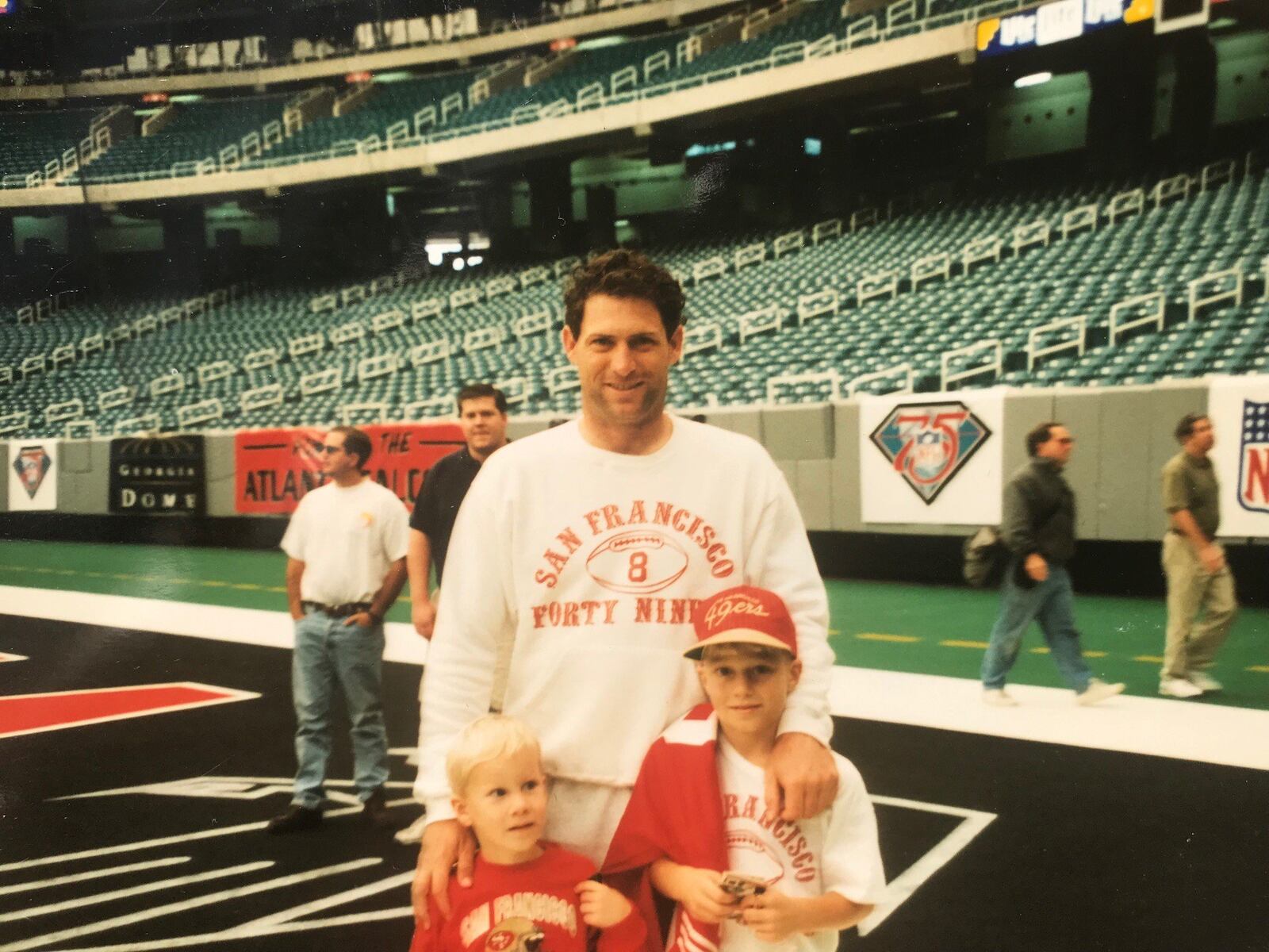 Sean McVay (right) younger brother Ryan (left) and San Francisco 49ers quarterback Steve Young in middle. Contributed photo