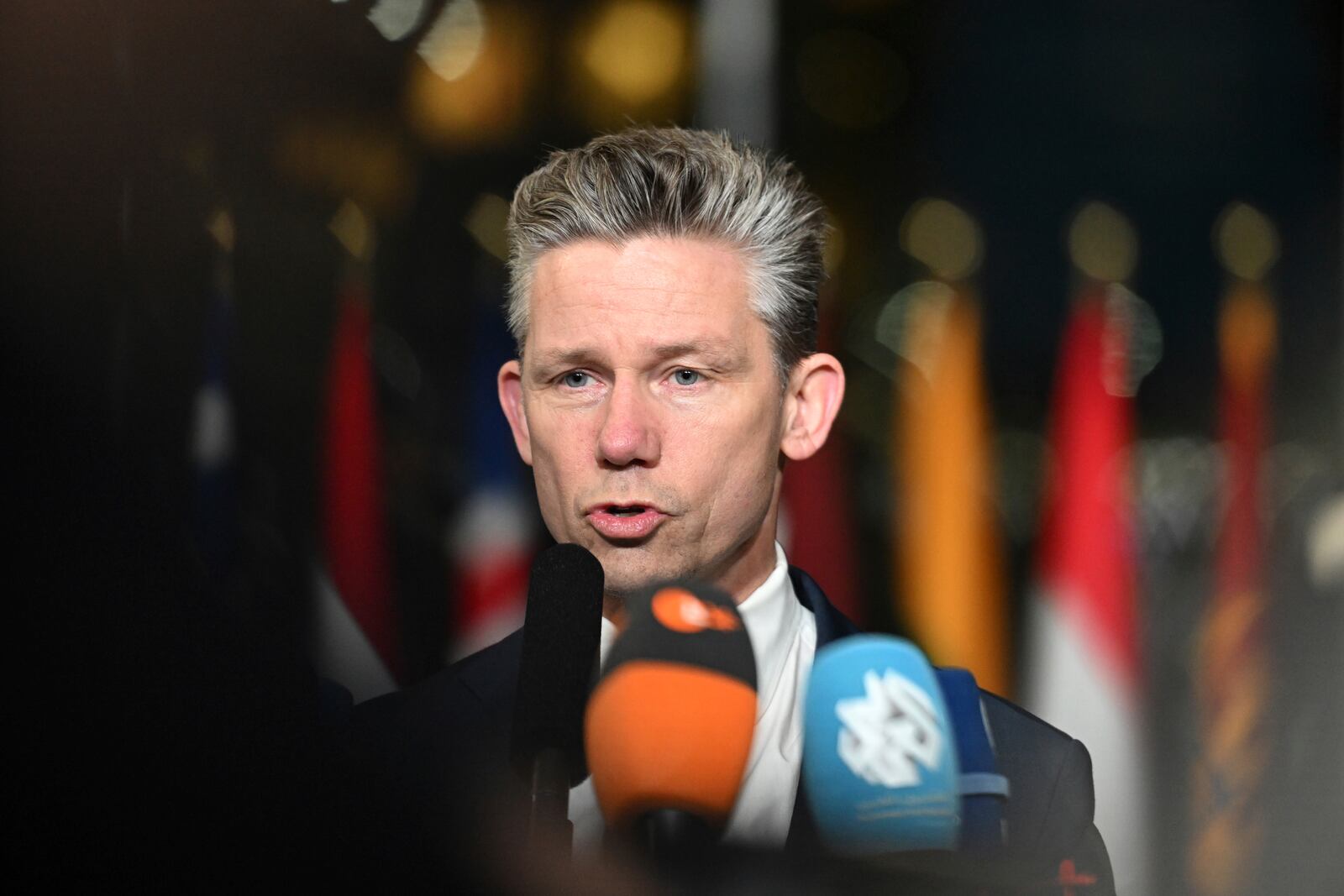 Sweden's Defense Minister Pal Jonson speaks with the media as he arrives for a meeting of NATO defense ministers at NATO headquarters in Brussels, Thursday, Feb. 13, 2025. (AP Photo/Harry Nakos)