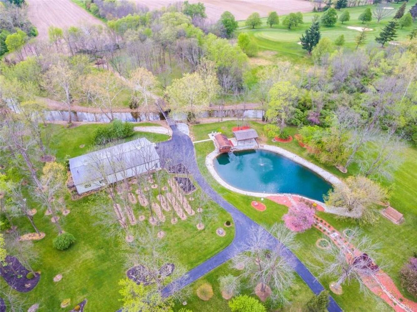 PHOTOS: Nearly 10-acre Miami County property listed has luxury home, stocked fishing pond