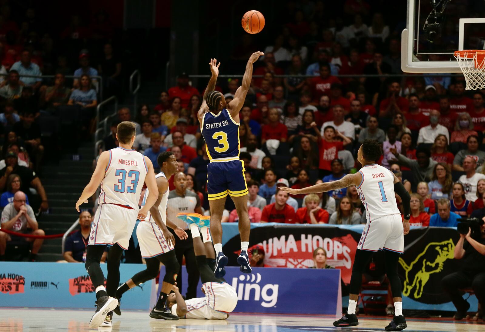 Best Virginia's Juwan Staten Sr. shoots against the Red Scare in the quarterfinals of The Basketball Tournament on Friday, July 29, 2022, at UD Arena. David Jablonski/Staff