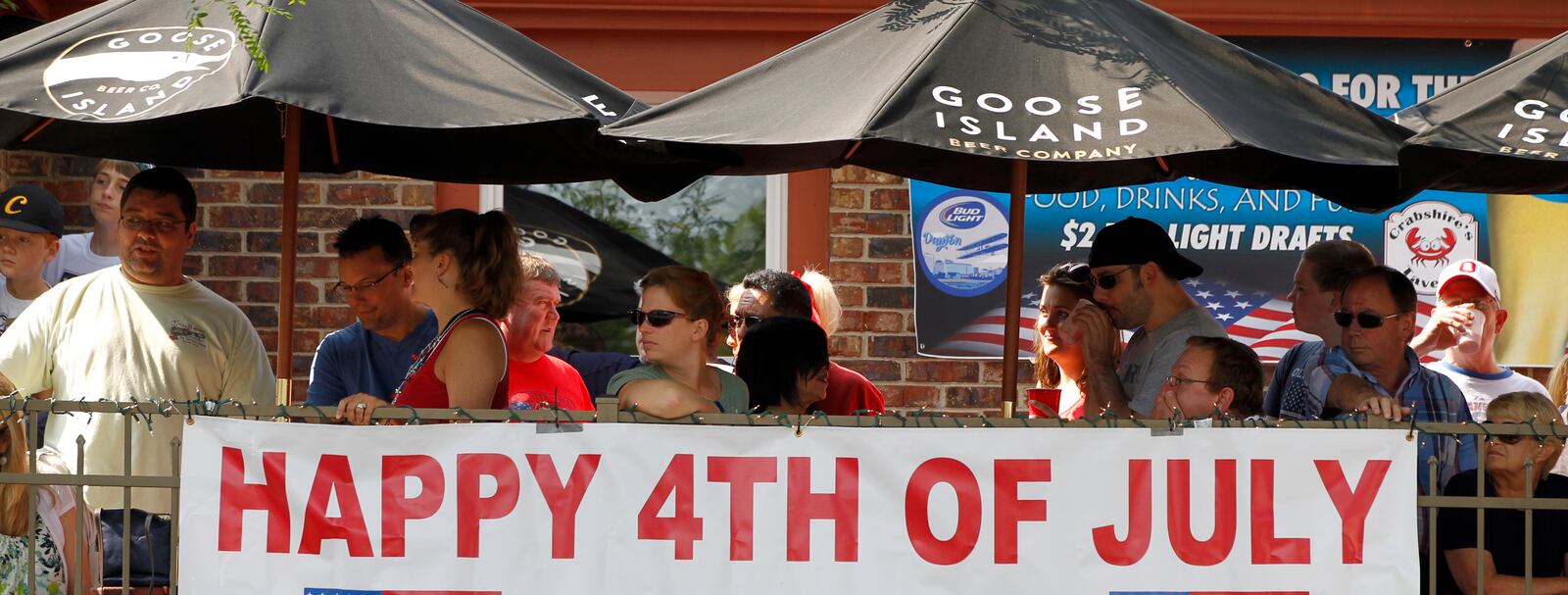 Centerville's Americana Festival parade makes its way down West Franklin Street Saturday. The festival, which was expected to draw over 75,000 people, featured the parade with over 120 units, a 5K run, a street fair and fireworks. LISA POWELL / STAFF