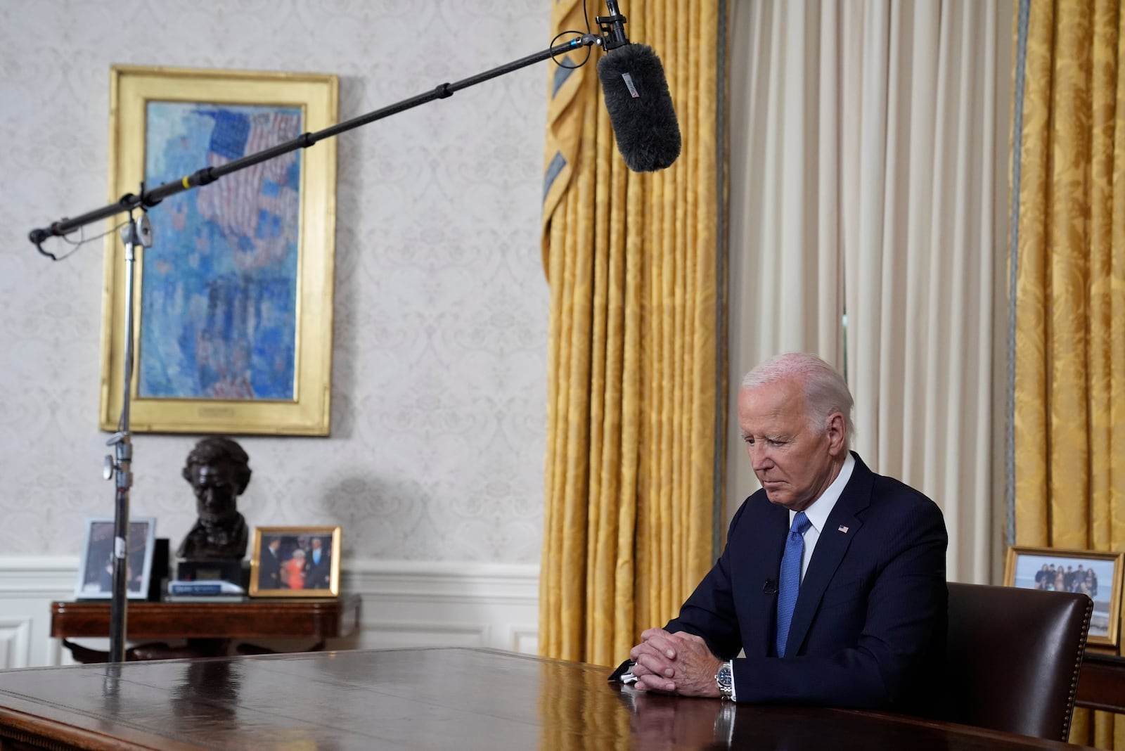 President Joe Biden pauses before he addresses the nation from the Oval Office of the White House in Washington, Wednesday, July 24, 2024, about his decision to drop his Democratic presidential reelection bid. (AP Photo/Evan Vucci, Pool)