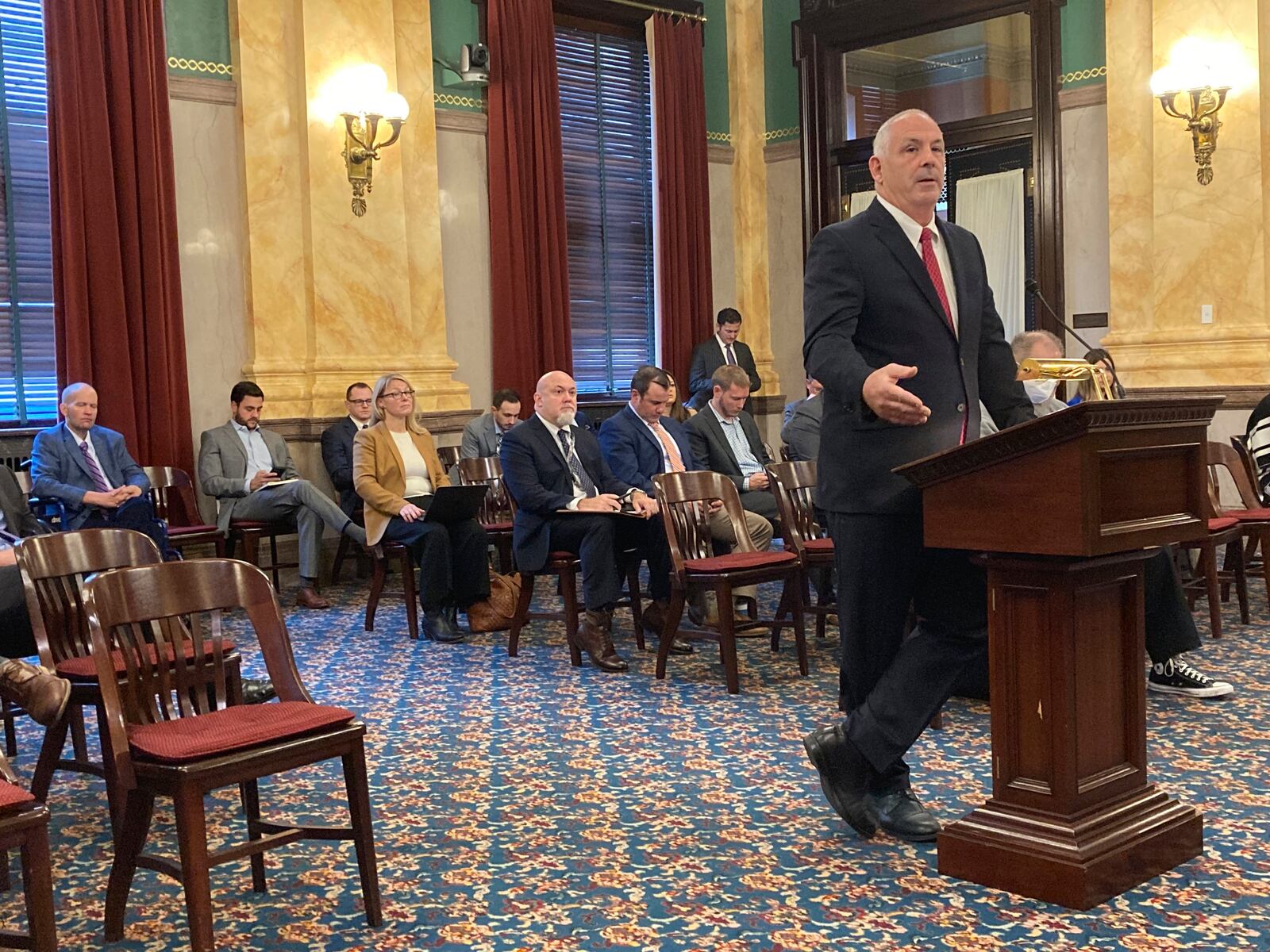 Sen. Steve Huffman, a Republican from Tipp City and a physician, answers questions about his bill that would expand Ohio's medical marijuana law, on Wednesday, Nov. 17, 2021, in Columbus, Ohio. Huffman, the sponsor of Ohio's current medical marijuana statute, has proposed increasing the square footage of marijuana cultivators' operations and the number of dispensaries able to sell the product. (AP Photo/Andrew Welsh-Huggins)