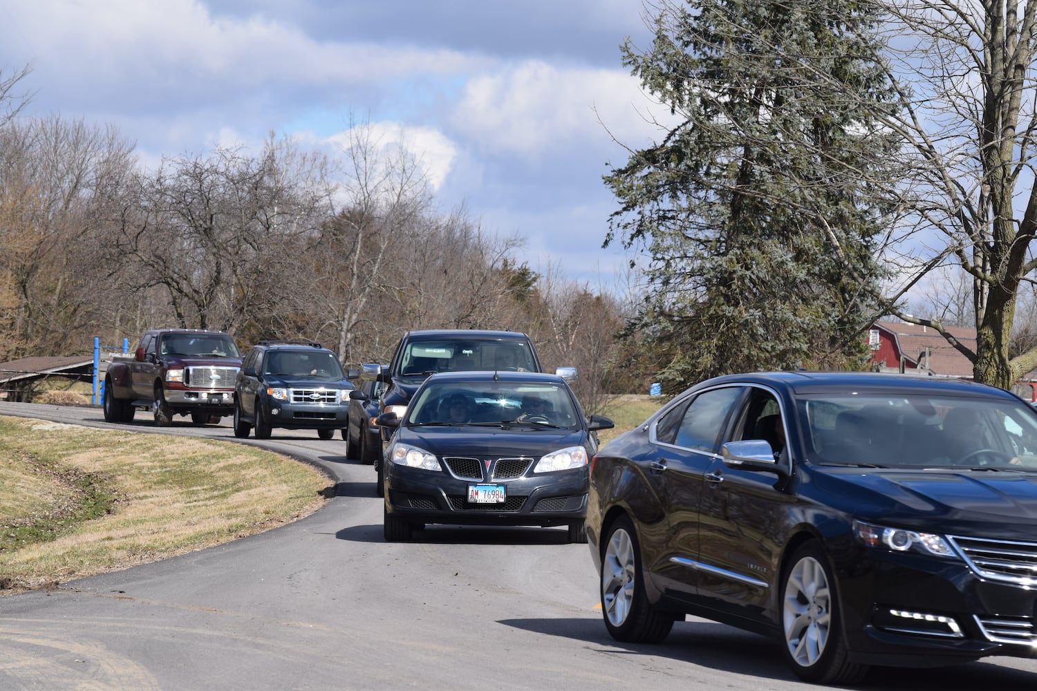 PHOTOS: Thousands of Outlaws attend motorcycle gang leaders funeral at Montgomery County Fairgrounds.