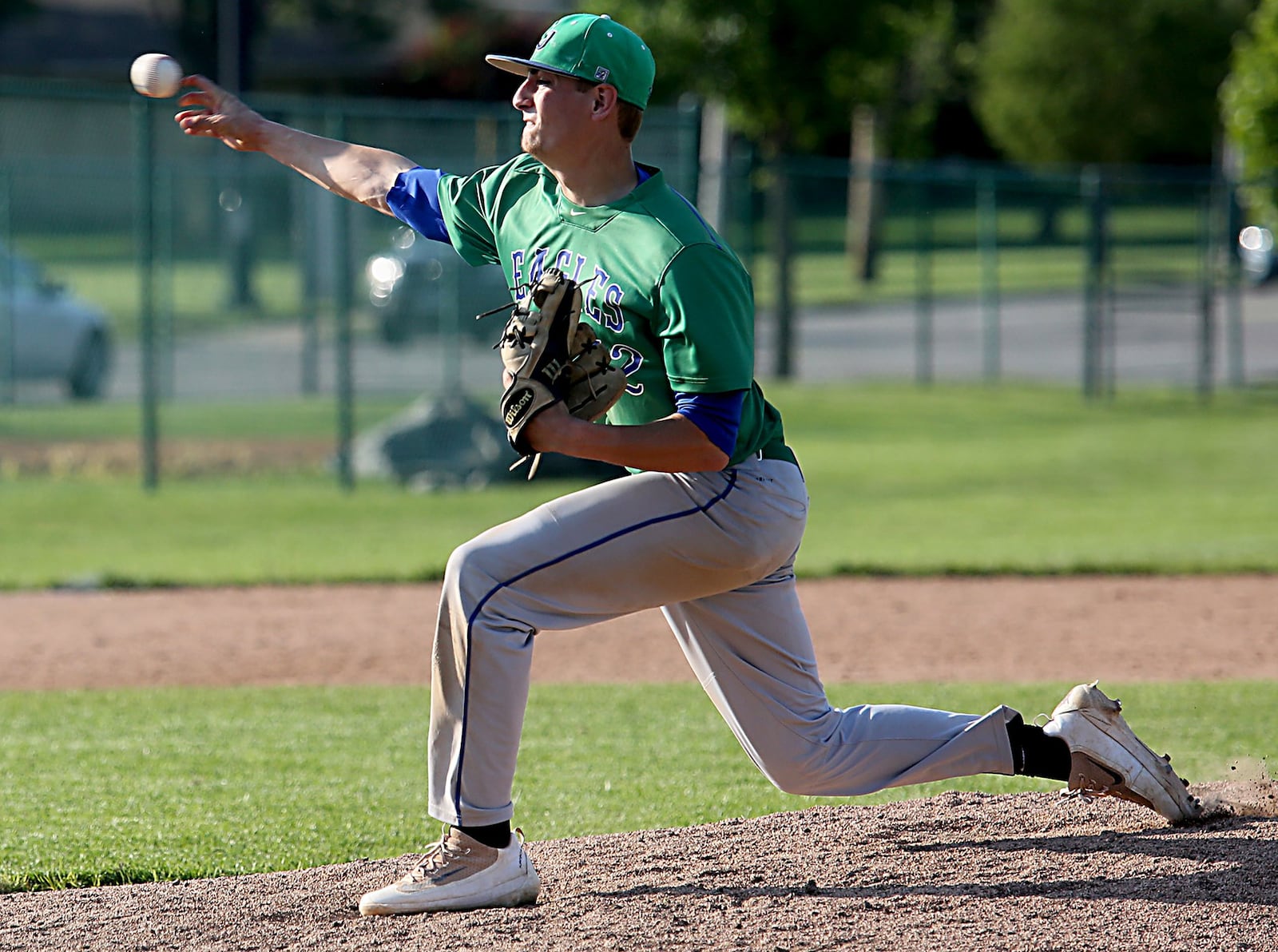 Chaminade Julienne’s Ryan Peltier throws a pitch en route to his first save of the season Friday in a Division II regional semifinal victory over Waynesville at Mason. CONTRIBUTED PHOTO BY E.L. HUBBARD