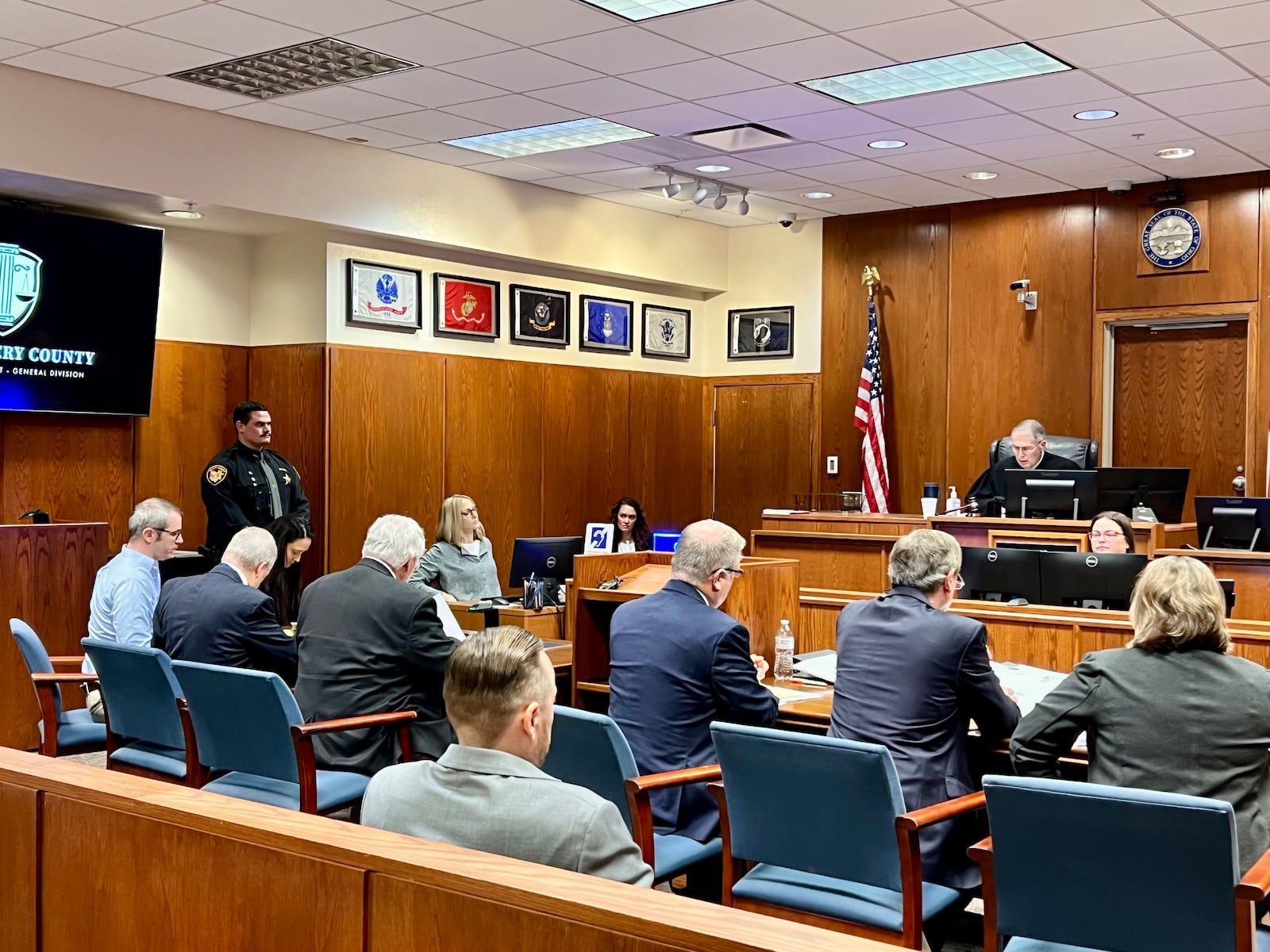 Stephen Marlow, far left, sits at the defendant's table with his lawyers during a hearing on Dec. 30, 2024, in Montgomery County Common Pleas Court. AIMEE HANCOCK/STAFF