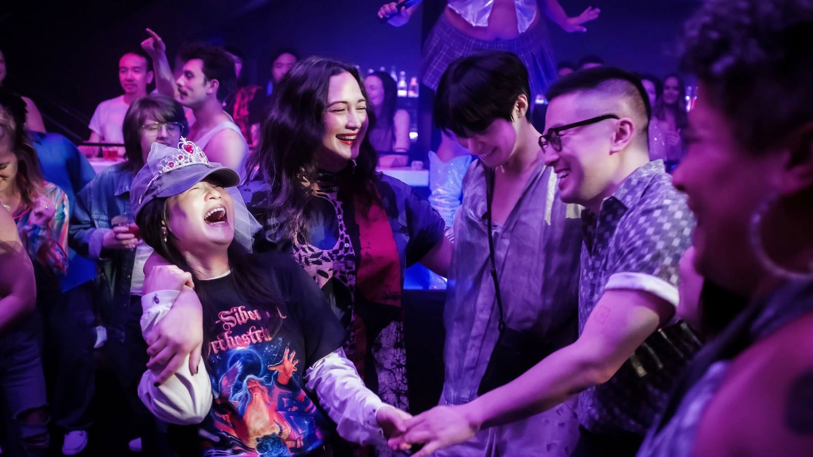 This image released by Sundance Institute shows, from left, Kelly Marie Tran, Lily Gladstone, Han Gi-Chan, and Bowen Yang in "The Wedding Banquet," by Andrew Ahn, an official selection of the 2025 Sundance Film Festival. (Luka Cyprian/Sundance Institute via AP)