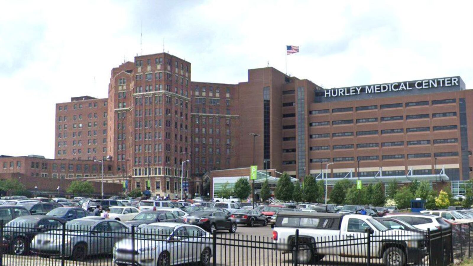 Hurley Medical Center in Flint, Mich., is pictured in a July 2019 Street View image. A 91-year-old patient at the hospital was beaten and stabbed by a fellow patient Friday, April 10, 2020. The man died two days later.