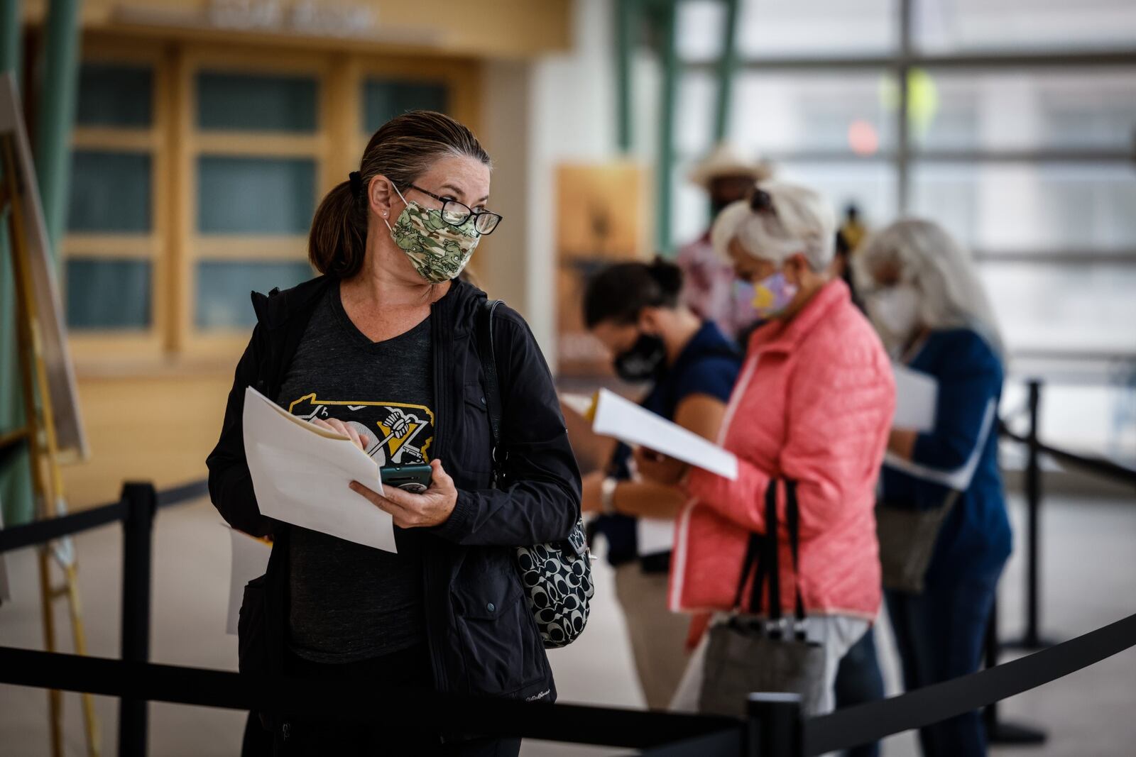 Jennifer Phillips, from Dayton, waits in line with about 50 others to buy tickets for the Broadway musical, "Hamilton," playing at the Schuster Center Jan. 26 through Feb. 6. JIM NOELKER/STAFF