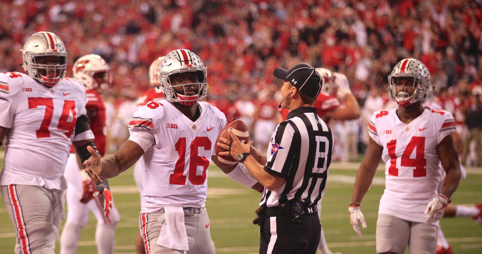 Ohio State’s J.T. Barrett celebrates a touchdown against Wisconsin in the Big Ten Championship on Saturday, Dec. 2, 2017, at Lucas Oil Stadium in Indianapolis, Ind. David Jablonski/Staff