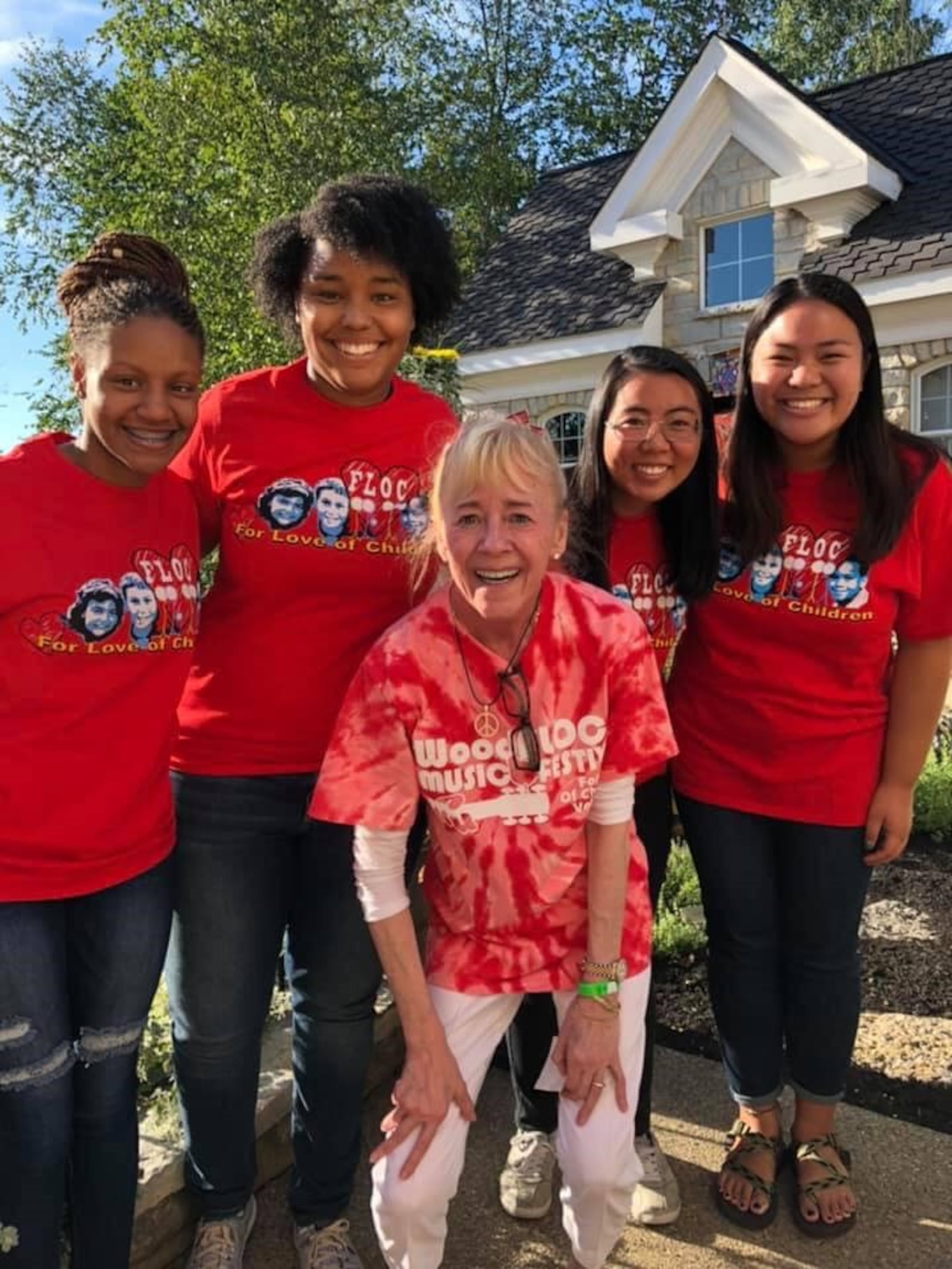 Beth Mann with a group of FLOC volunteers at FLOC's WoodFLOCk gala.