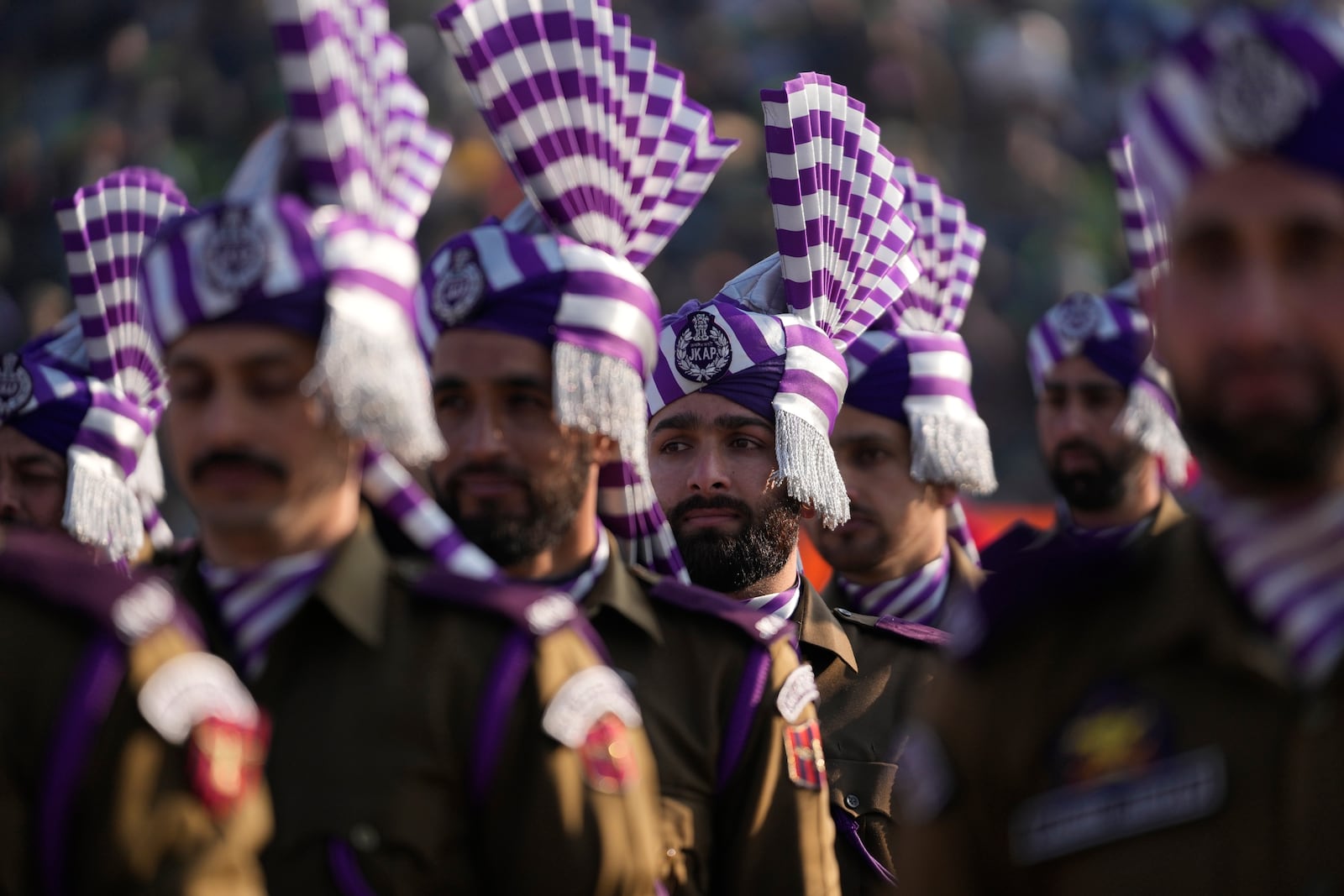 Police officers stand in a formation during India's Republic Day parade in Srinagar, Indian controlled Kashmir, Sunday, Jan. 26, 2025. (AP Photo/Mukhtar Khan)