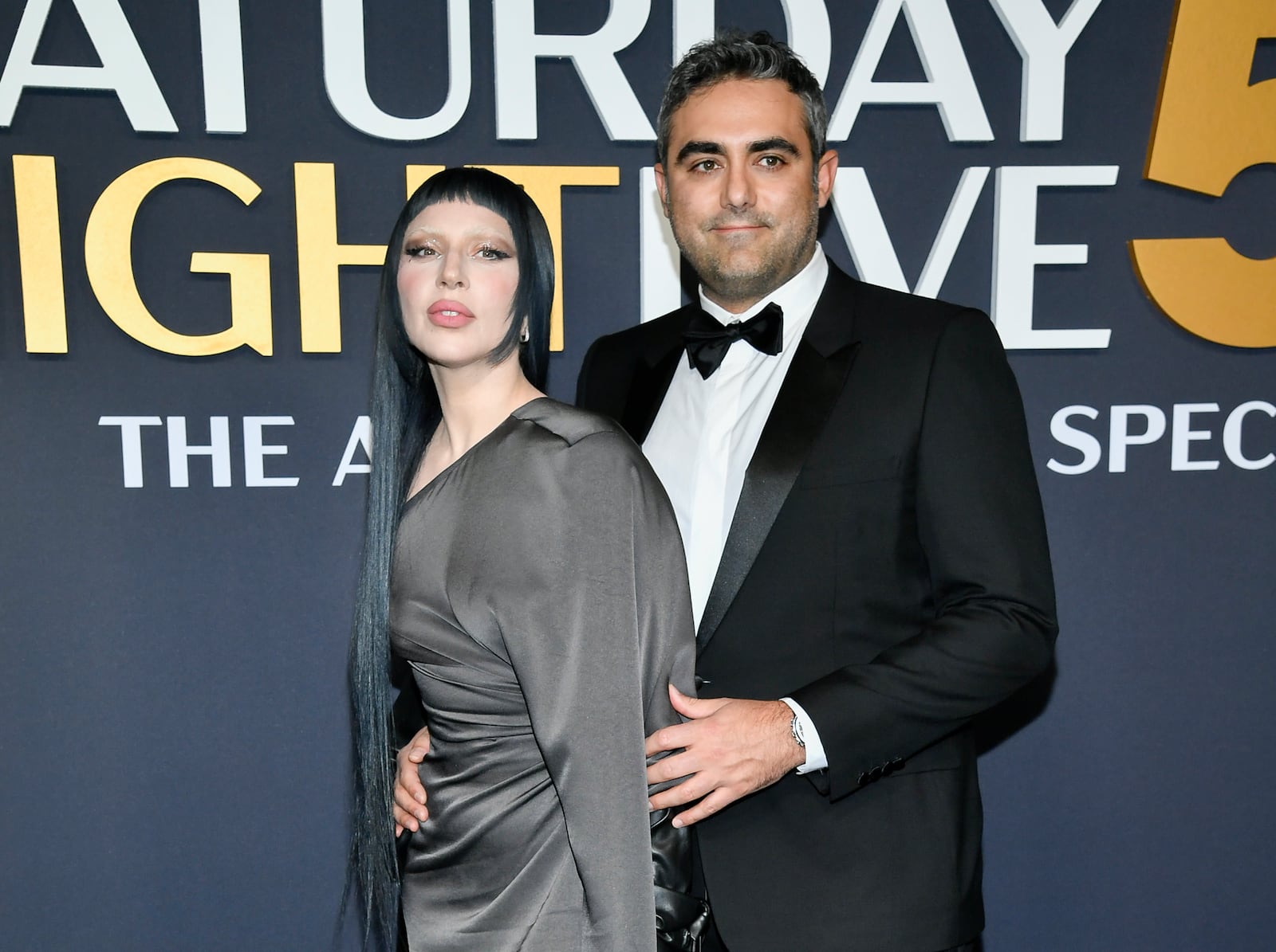 Lady Gaga, left, and fiancé Michael Polansky attend the "SNL50: The Anniversary Special" at Rockefeller Plaza on Sunday, Feb. 16, 2025, in New York. (Photo by Evan Agostini/Invision/AP)