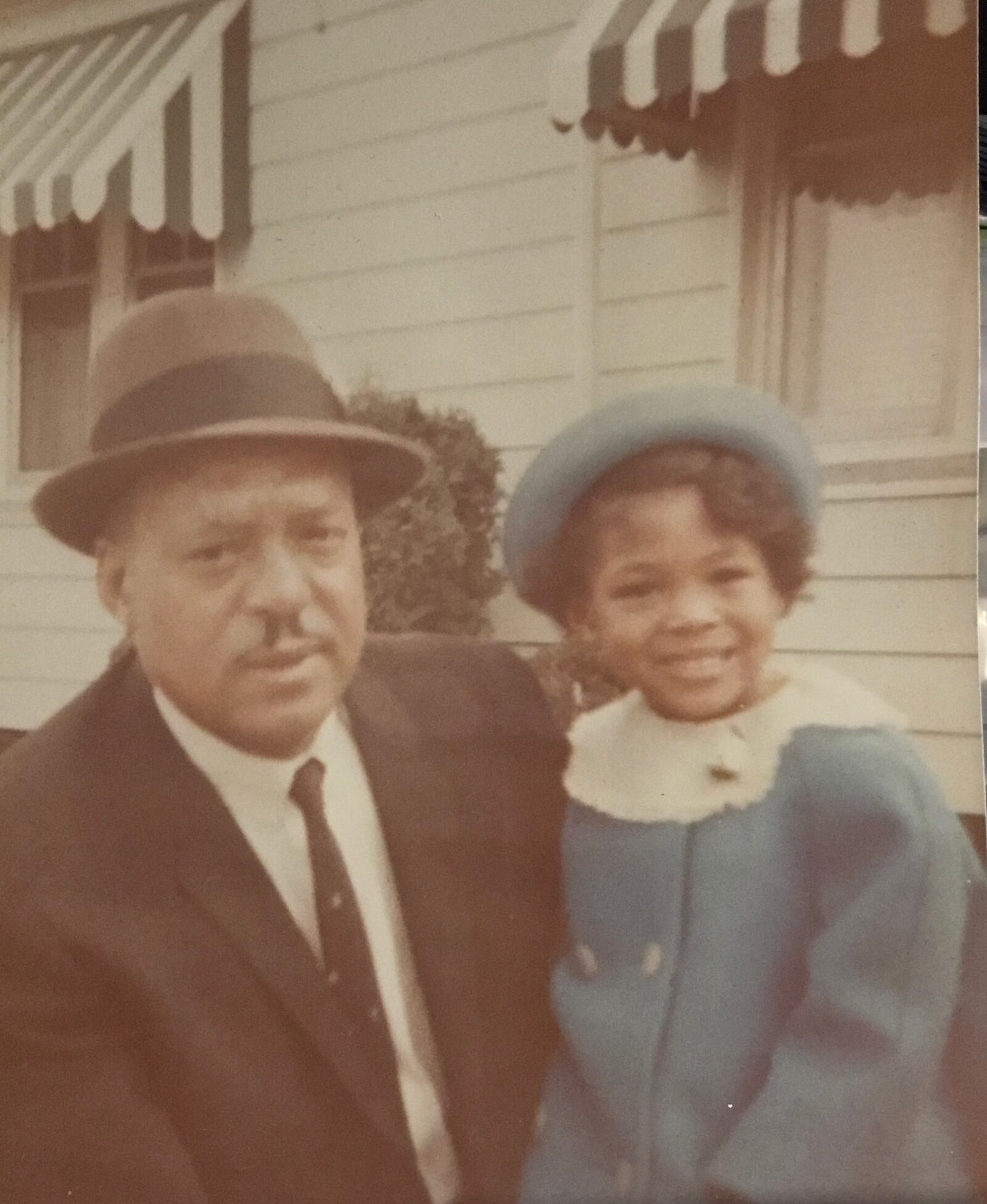 Patricia Smith Griffin grew up in Dayton and was the youngest of nine children. She is shown on the right with her father, J.C. Smith on Easter of 1964 in Dayton. CONTRIBUTED