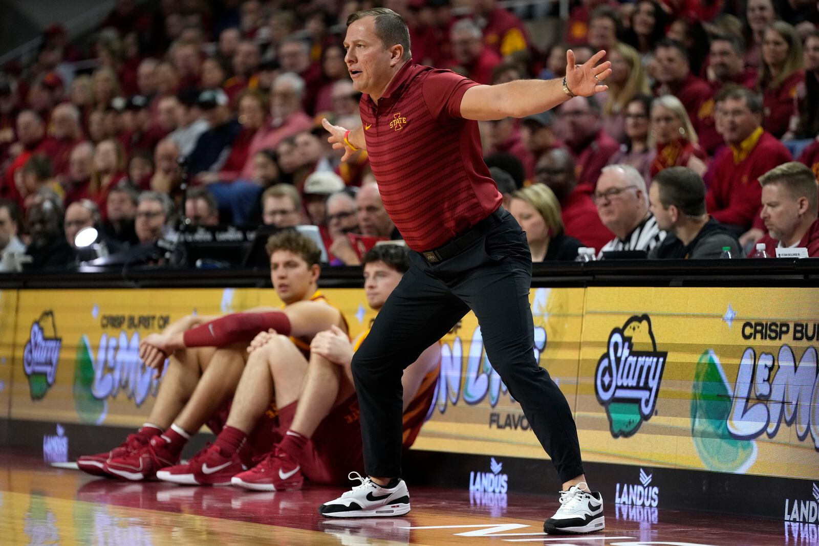 Iowa State head coach T.J. Otzelberger directs his team during the first half of an NCAA college basketball game against Cincinnati Saturday, Feb. 15, 2025, in Ames, Iowa. (AP Photo/Charlie Neibergall)