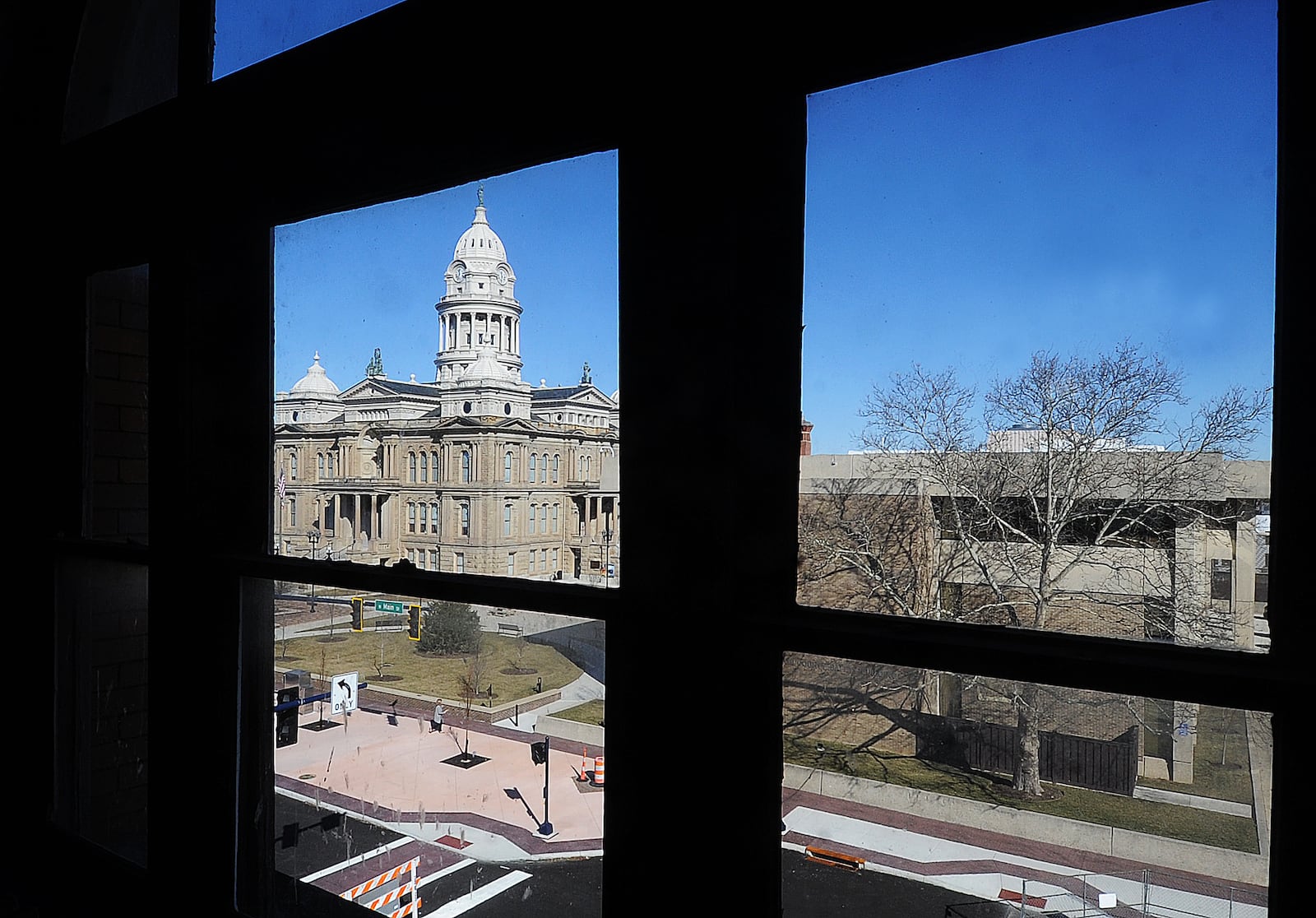 The current Miami County Courthouse is visible across West Main Street from inside the Troy Tavern/IOOF building, which the Troy Historic Preservation Alliance is trying to save. Part of the Tavern/IOOF building served as a courthouse in the 19th century. MARSHALL GORBY\STAFF