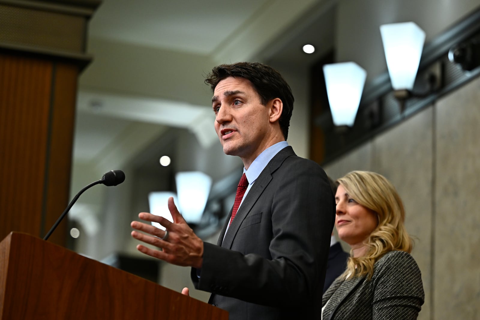 Canada's Prime Minister Justin Trudeau addresses media following the imposition of a raft of tariffs by U.S. President Donald Trump against Canada, Mexico and China, in Ottawa, Saturday, Feb. 1, 2025. (Justin Tang/The Canadian Press via AP)