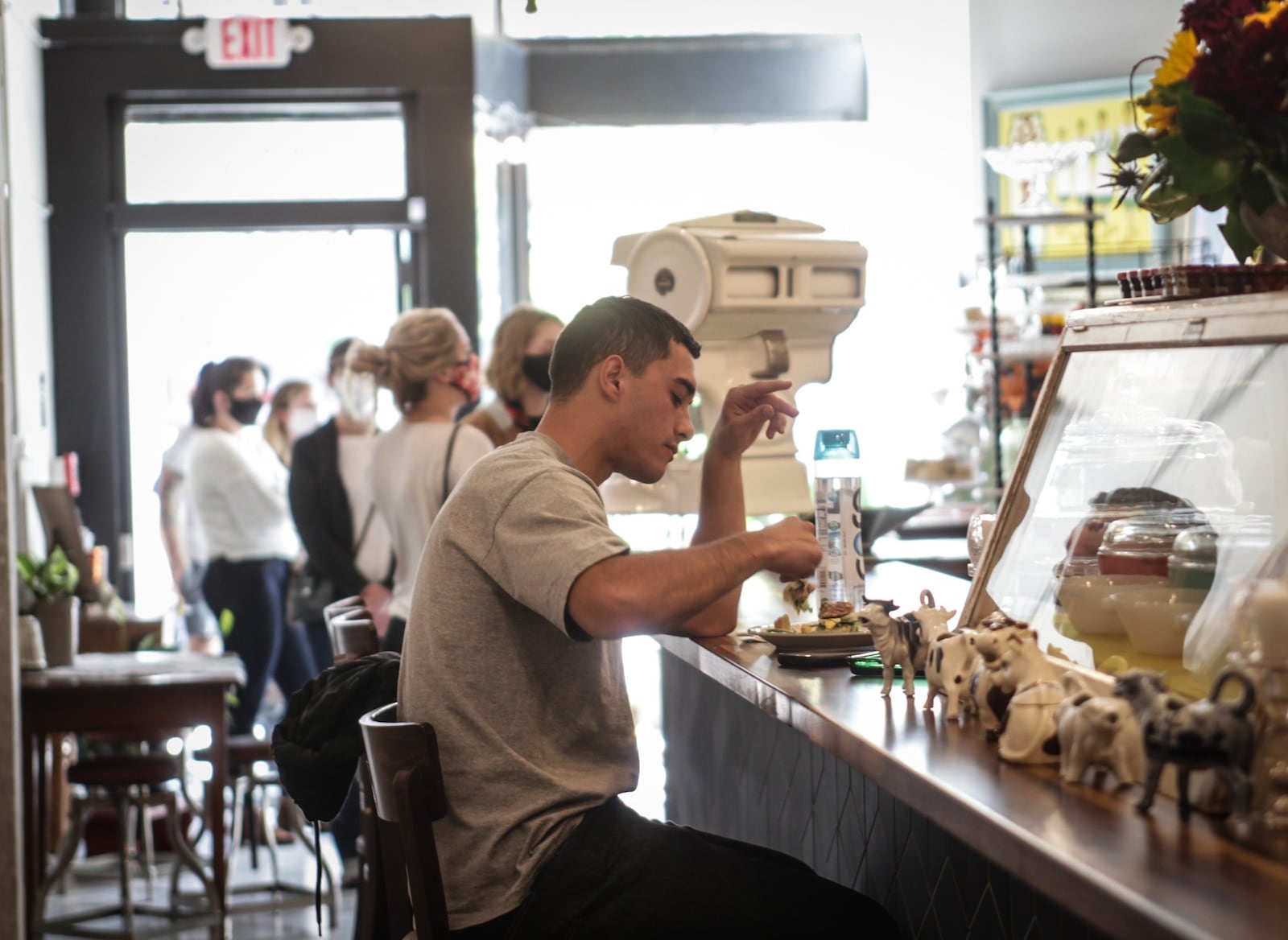 Graham Hunter, from Dayton, eats at the newly opened, Salt Block Biscuit Company on Third Street in the Fire Block District Tuesday September 22,2020.