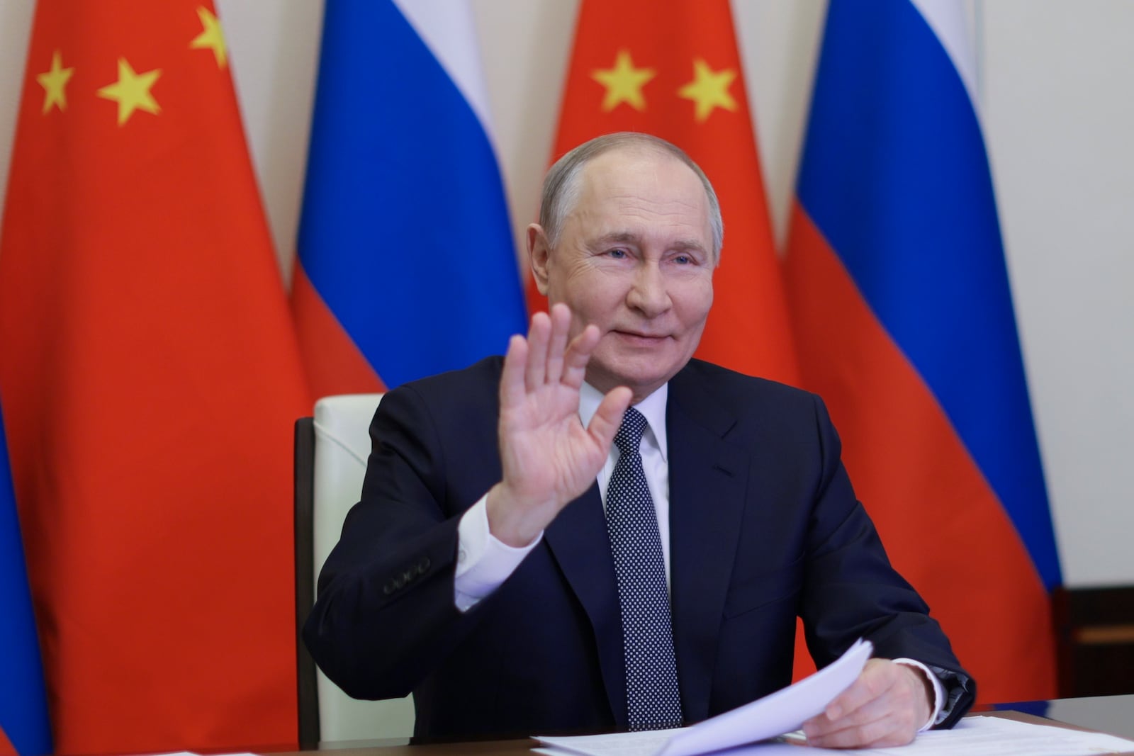 Russian President Vladimir Putin speaks with Chinese President Xi Jinping via videoconference at Novo-Ogaryovo state residence outside of Moscow, Russia, Tuesday, Jan. 21, 2025. (Gavriil Grigorov, Sputnik, Kremlin Pool Photo via AP)