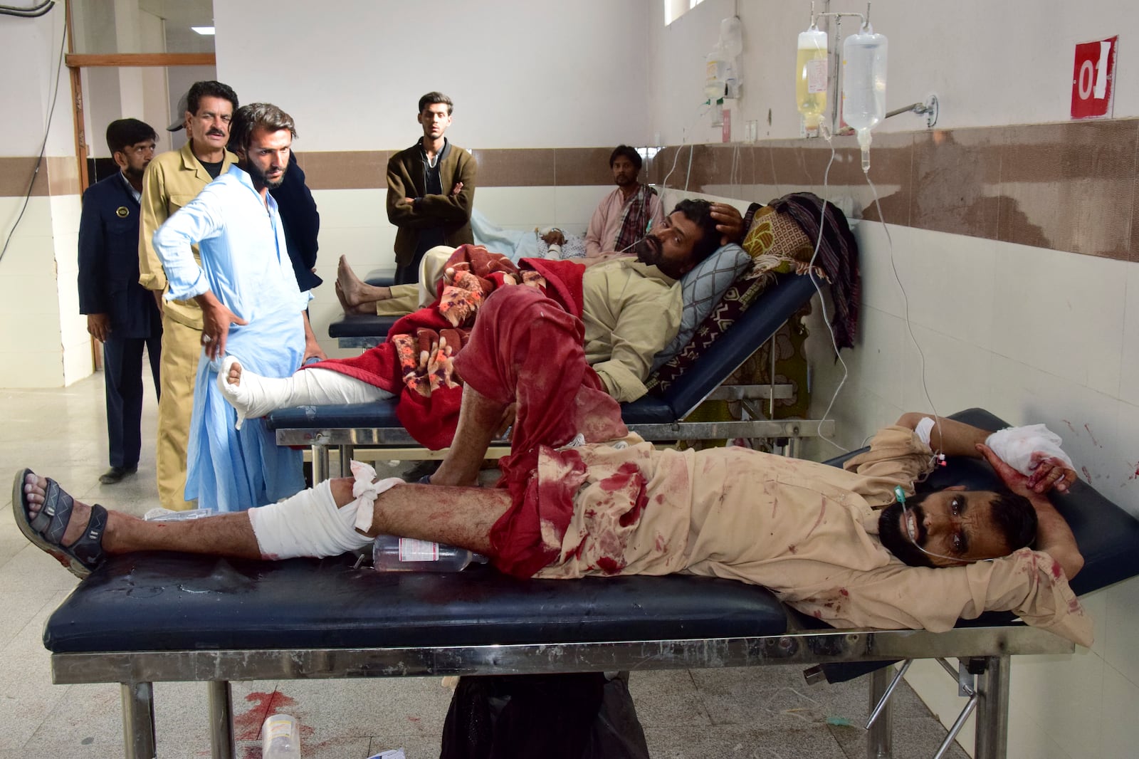 Injured victims of bomb explosion at railway station, are treated at a hospital, in Quetta, southwestern Pakistan, Saturday, Nov. 9, 2024. (AP Photo/Arshad Butt)