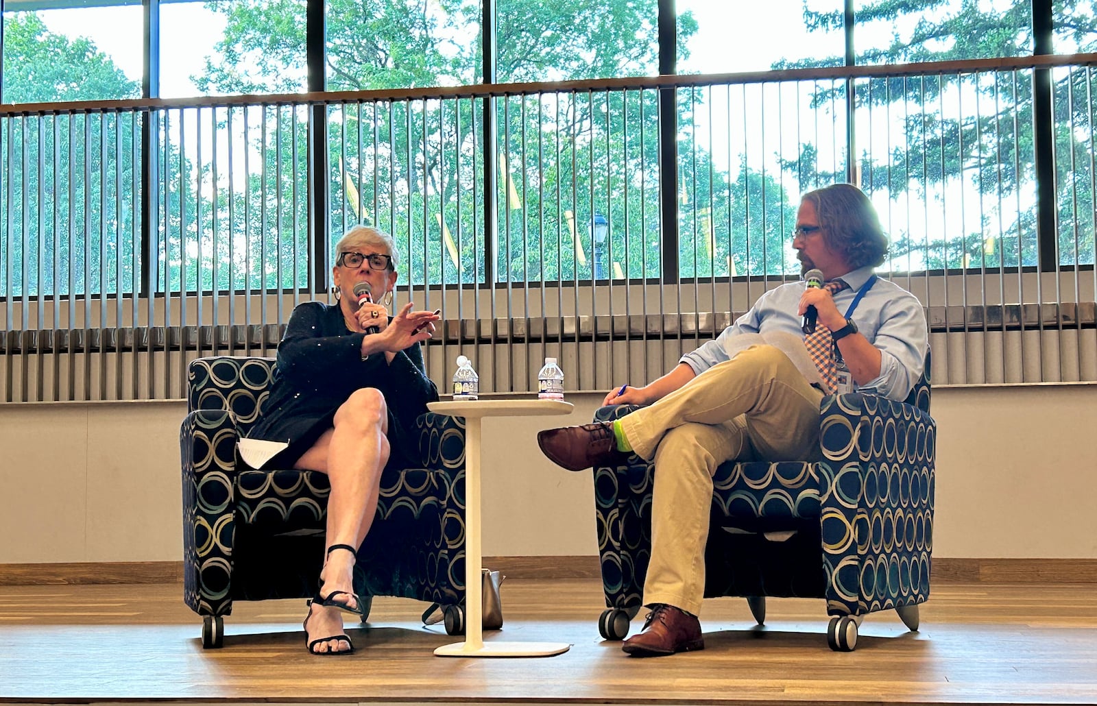 Retired Chief Justice Maureen O'Connor, left, answers questions about Issue 1, a redistricting reform that would bar politicians from drawing legislative districts. Dayton Daily News reporter Josh Sweigart, right, moderates. August 20, 2024.