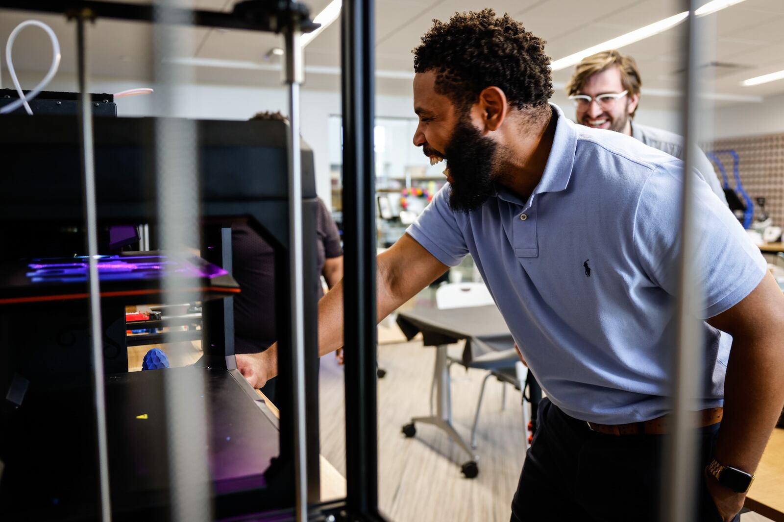 Lead for the Outreach Committee Westside Makerspace, Dr. Marcus Smith operates a 3D printer at the West Dayton Library Makerspace Friday May 19, 2022. The Markerspace is getting a $1 million grant from the city of Dayton using American Rescue Plan funds to expand the makerspace. JIM NOELKER/STAFF