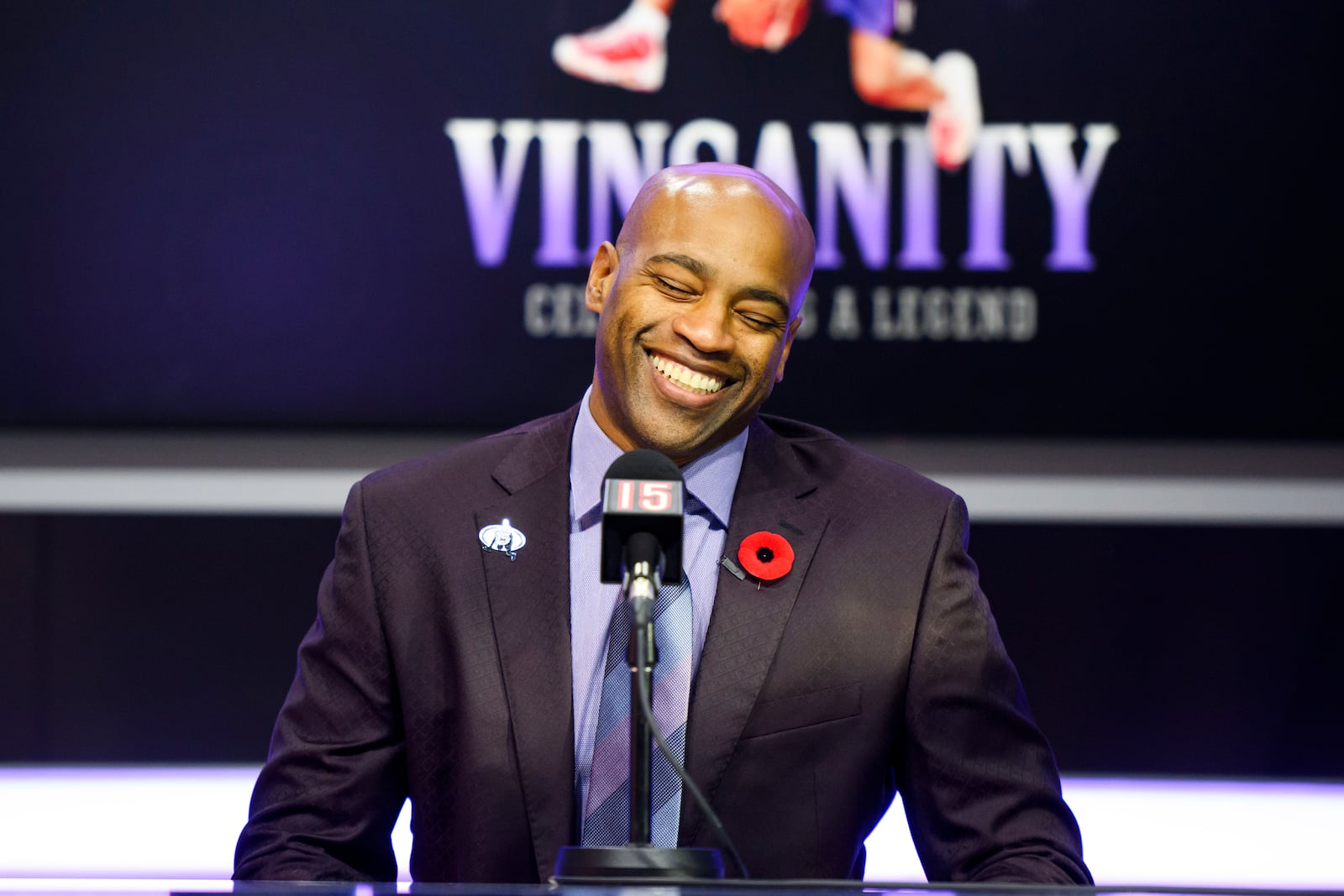 Former Toronto Raptors player Vince Carter speaks to media ahead of his number retirement, before an NBA basketball game between the Toronto Raptors and the Sacramento Kings at the Scotiabank arena in Toronto on Saturday, Nov. 2, 2024. (Christopher Katsarov/The Canadian Press via AP)