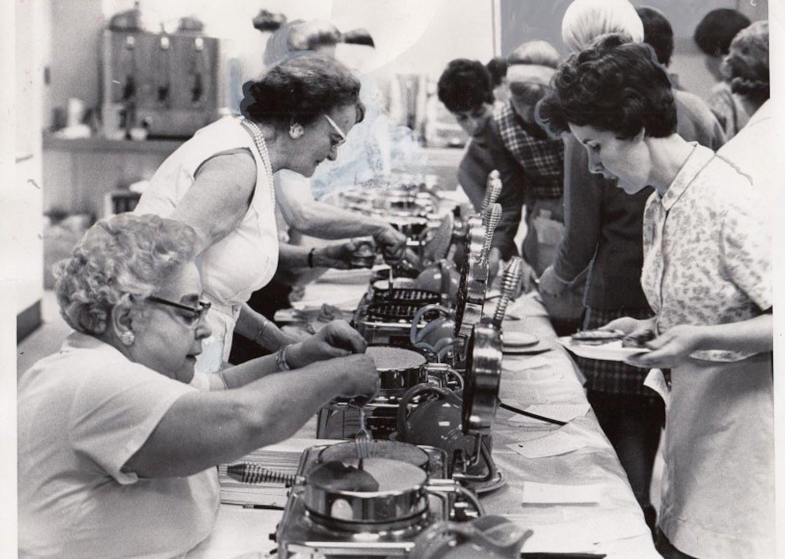 Christ Episcopal Church's Women of the Parochial Society, one of eight women s groups at the church at the time, launched Waffle Shop in 1929. The holiday fundraiser has grown over the years. Photo: Dec. 3, 1969 by Al Wilson, Journal Herald. DAYTON DAILY NEWS ARCHIVES