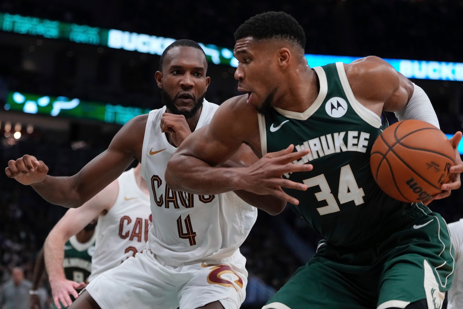 Milwaukee Bucks' Giannis Antetokounmpo tries to get past Cleveland Cavaliers' Evan Mobley during the first half of an NBA basketball game Saturday, Nov. 2, 2024, in Milwaukee. (AP Photo/Morry Gash)