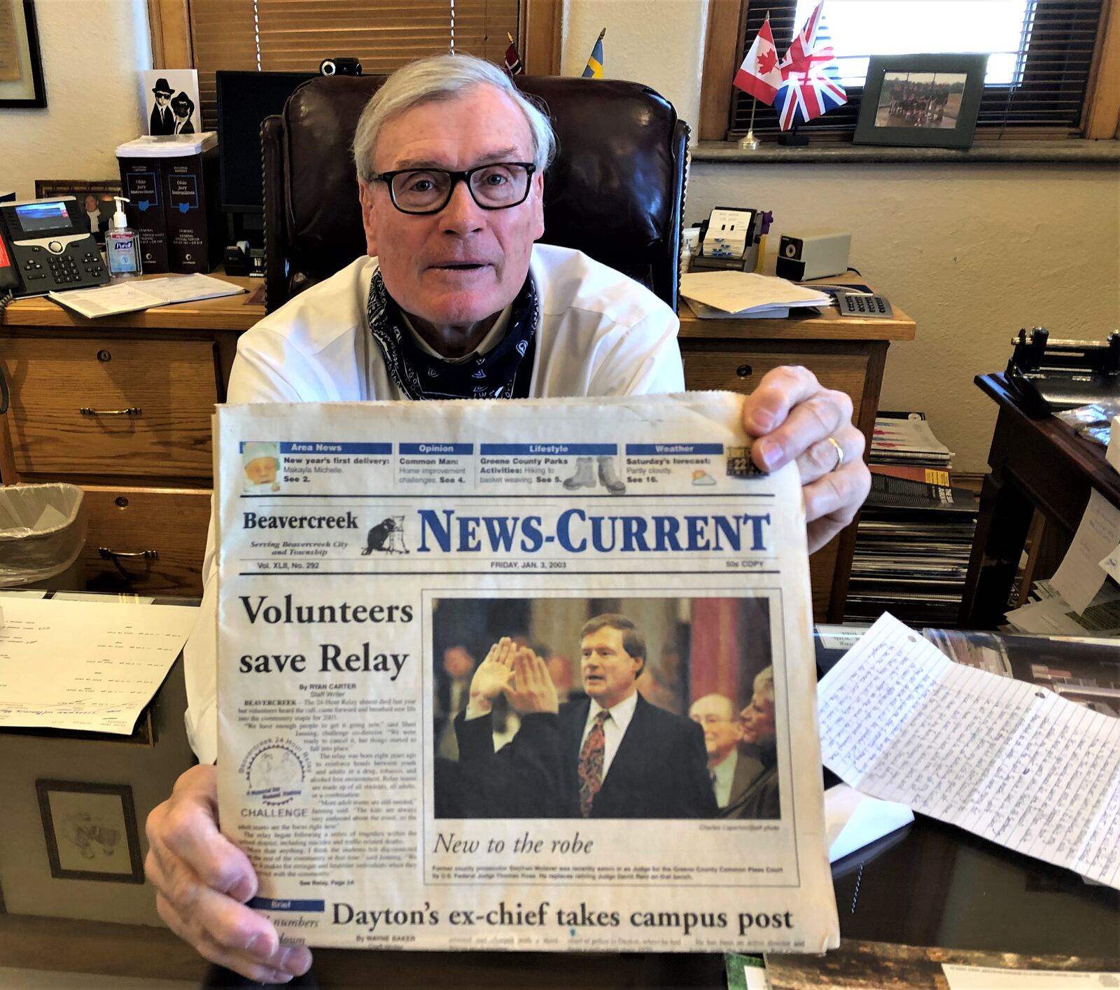 Judge Stephen Wolaver will be retiring from the Greene County Common Pleas Court at the end of 2020. Here he holds a newspaper from the day he was first sworn in. STAFF/BONNIE MEIBERS