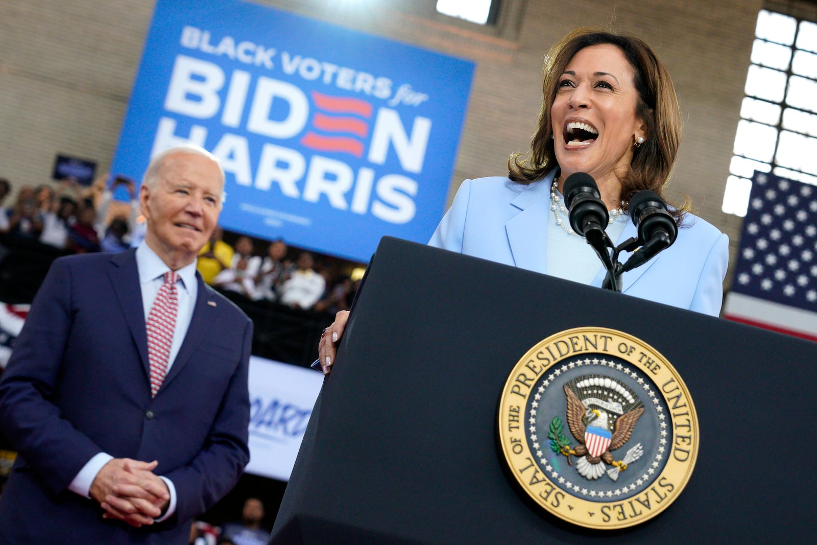 FILE — Vice President Kamala Harris speaks as President Joe Biden looks on at a reelection campaign event in Philadelphia on May 29, 2024.  In a sprint of a race, Harris is poised to attack former President Donald Trump on his felonies and, in a 2024 twist, his age, but Republicans will be galvanized to fight her, too. (Yuri Gripas/The New York Times)
                      