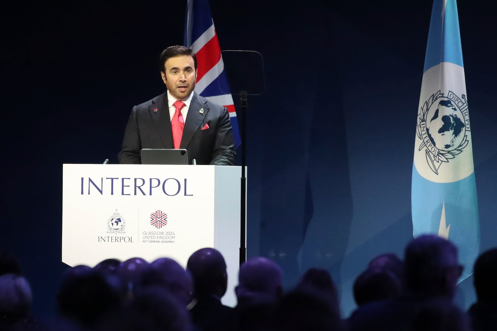 The President of Interpol, Ahmed Naser Al Raise, speaking at the opening ceremony for the Interpol General Assembly in Glasgow, Scotland, Monday, Nov. 4, 2024. (AP Photo/Scott Heppell)